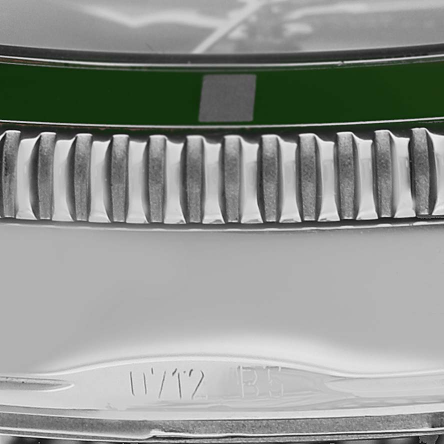 The image shows a close-up of the bezel and part of the case of a Breitling Superocean A17321 Men's Stainless Steel Black Dial A17321 Men's Stainless Steel Black Dial watch.