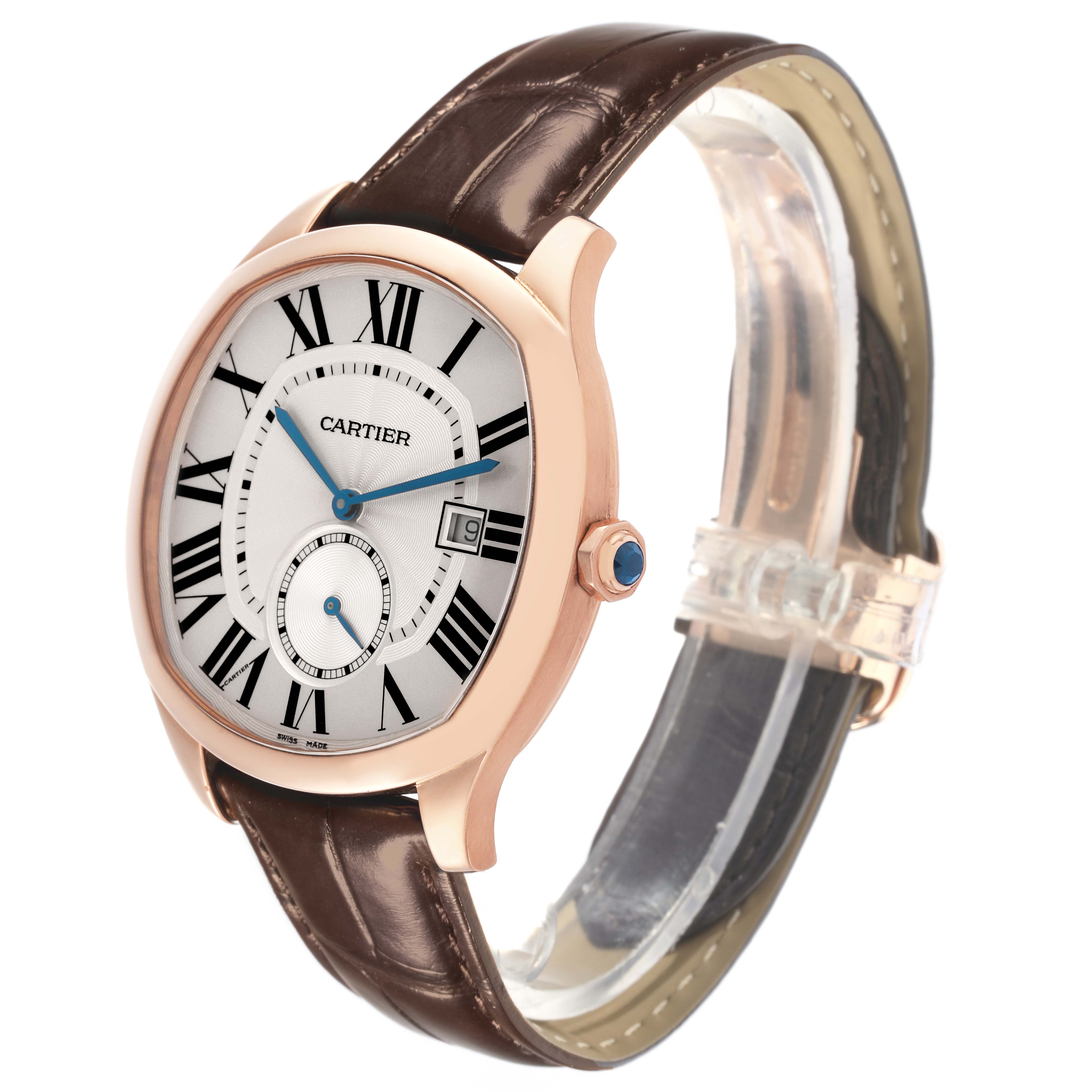 The image shows a Drive de Cartier watch by Cartier at a three-quarter angle, revealing its dial, bezel, and leather strap.