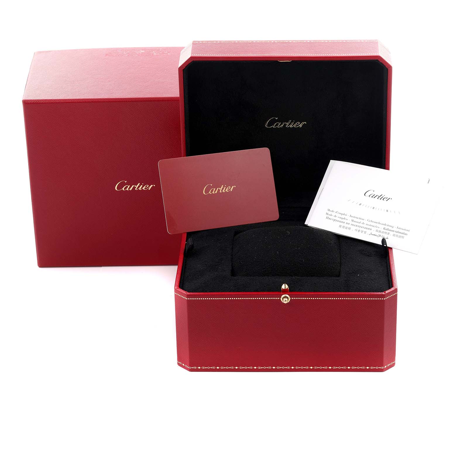 The image shows a red Drive de Cartier watch box from Cartier with a card and booklet displayed.