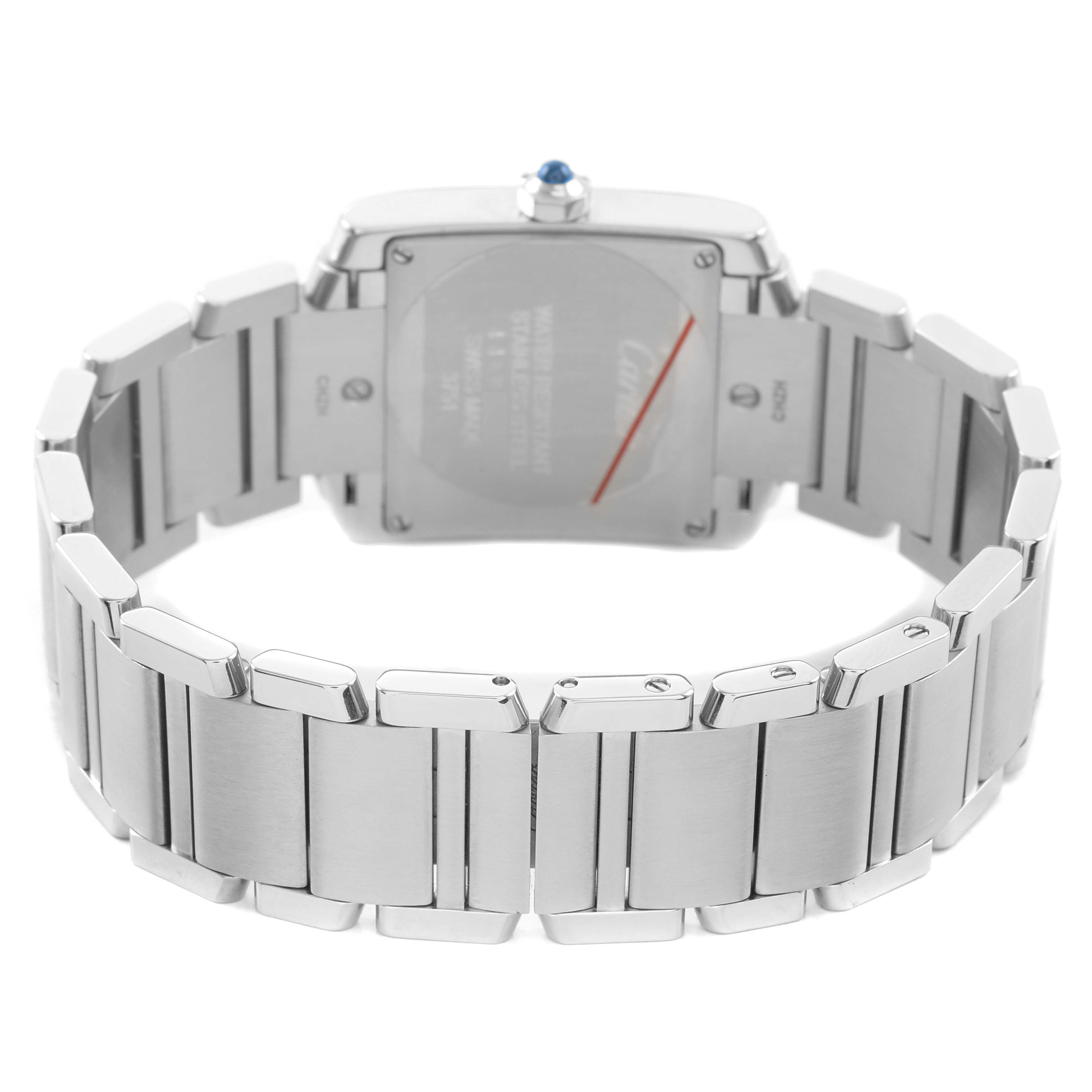 The image shows the back and bracelet of a Cartier Tank Française watch, highlighting the stainless steel links and case back.