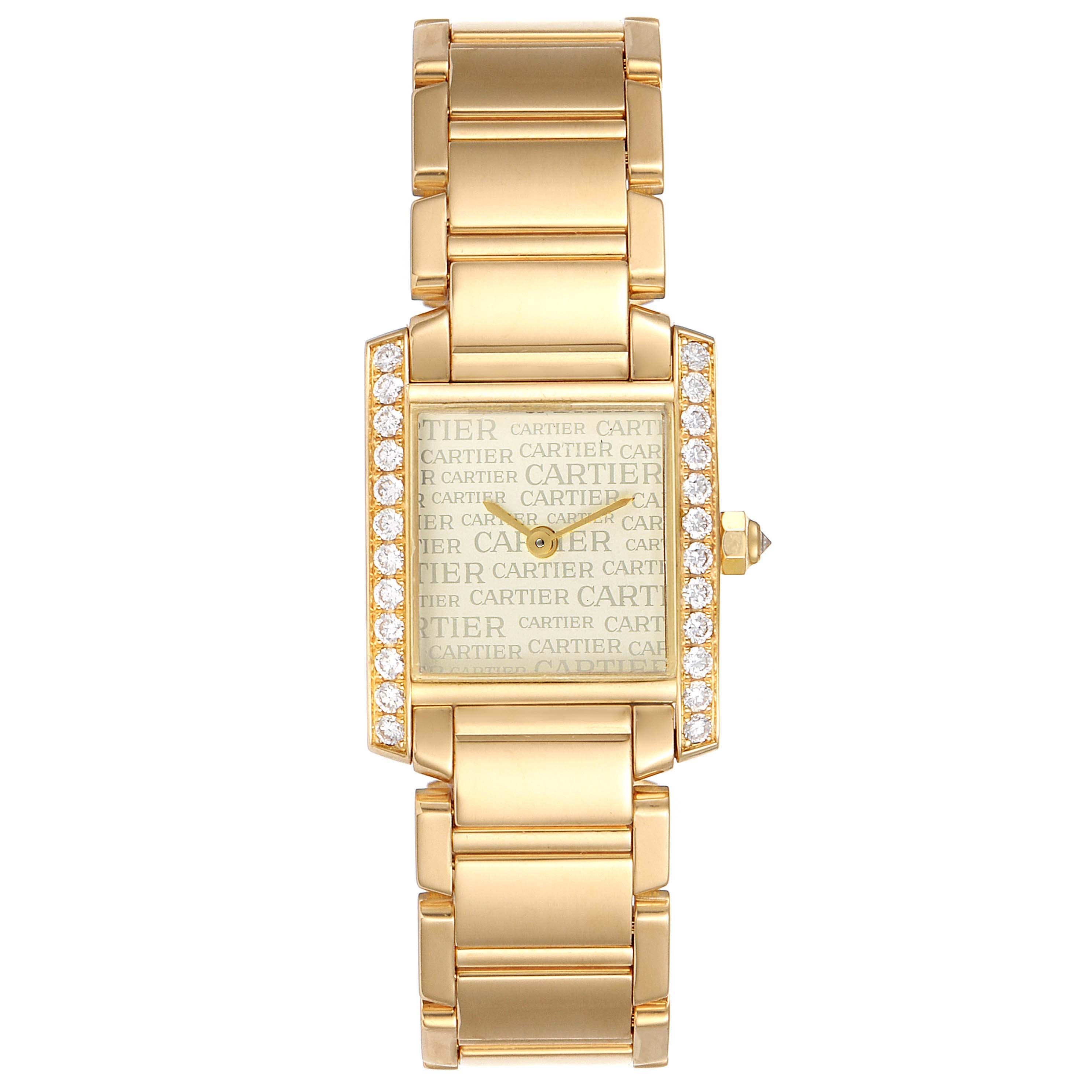 The image shows a top-down view of the Cartier Tank Francaise WE1023R8 Women
s Yellow Gold Silver Dial WE1023R8 Women
s Yellow Gold Silver Dial watch, highlighting its gold bracelet and diamond-set case.