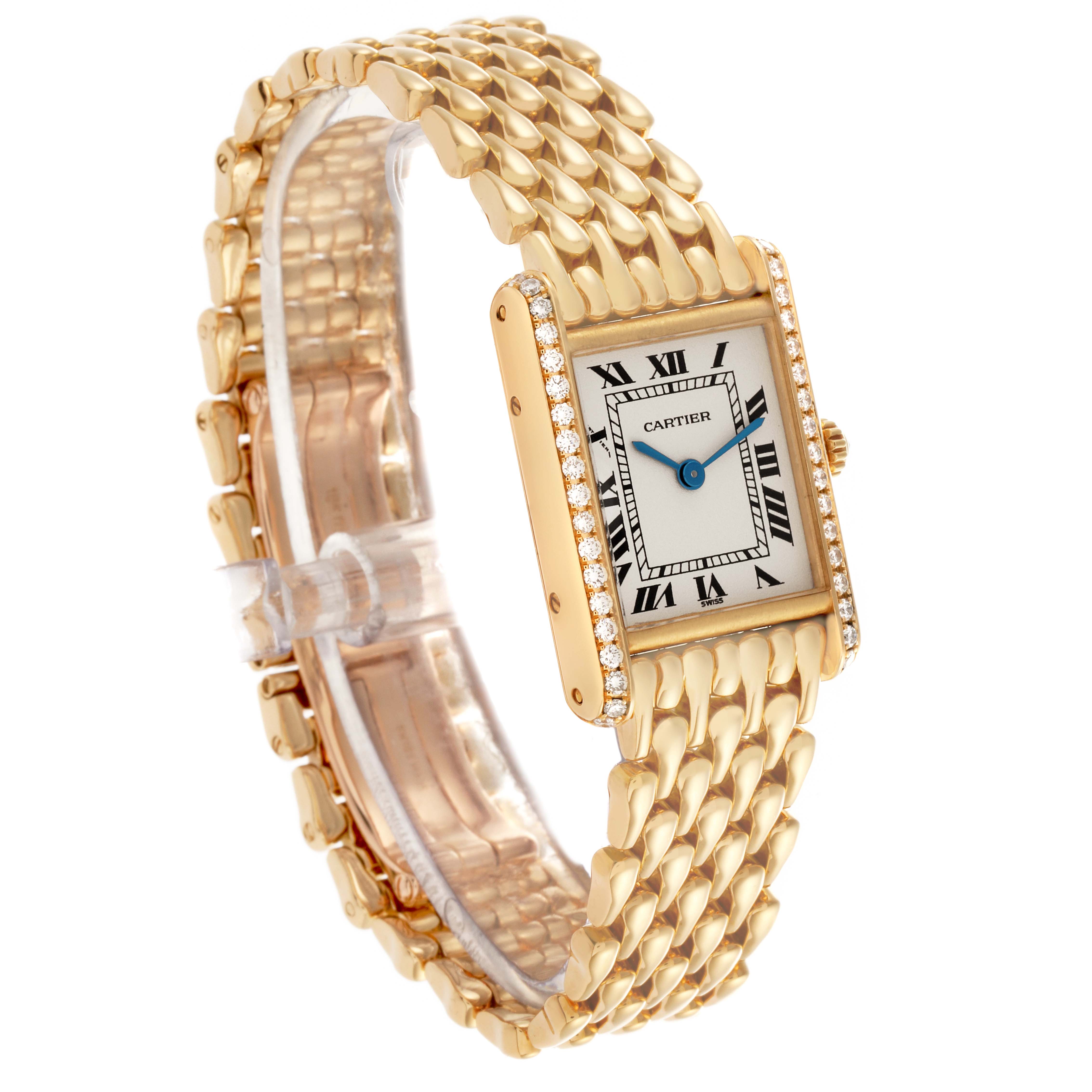 The Cartier Tank Louis WA2013K3 Women's Yellow Gold Silver Dial WA2013K3 Women's Yellow Gold Silver Dial watch is shown at a three-quarter angle, highlighting its rectangular face, diamond bezel, and gold bracelet.