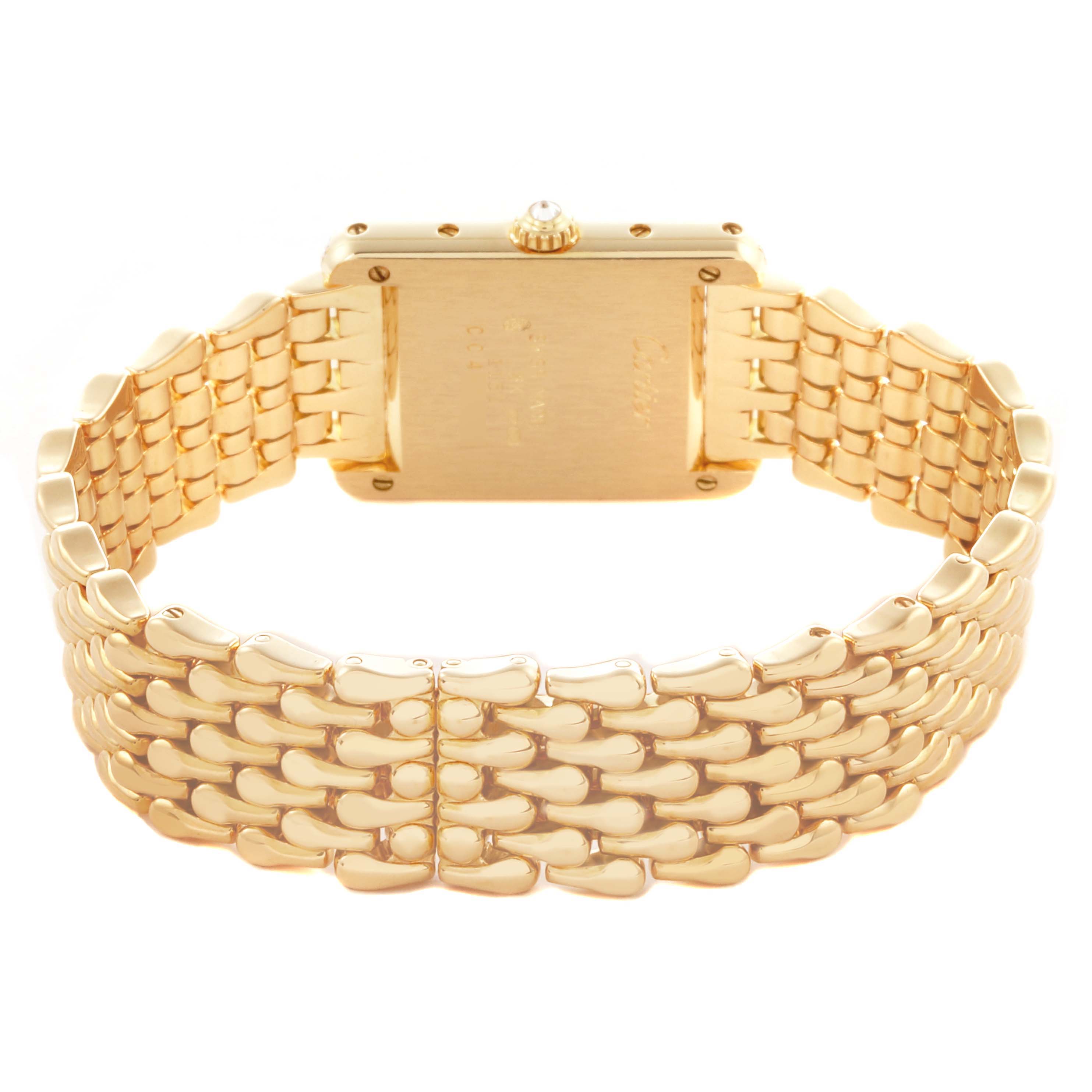 The image shows the back view of the Cartier Tank Louis WA2013K3 Women's Yellow Gold Silver Dial WA2013K3 Women's Yellow Gold Silver Dial watch, highlighting its gold bracelet and case.