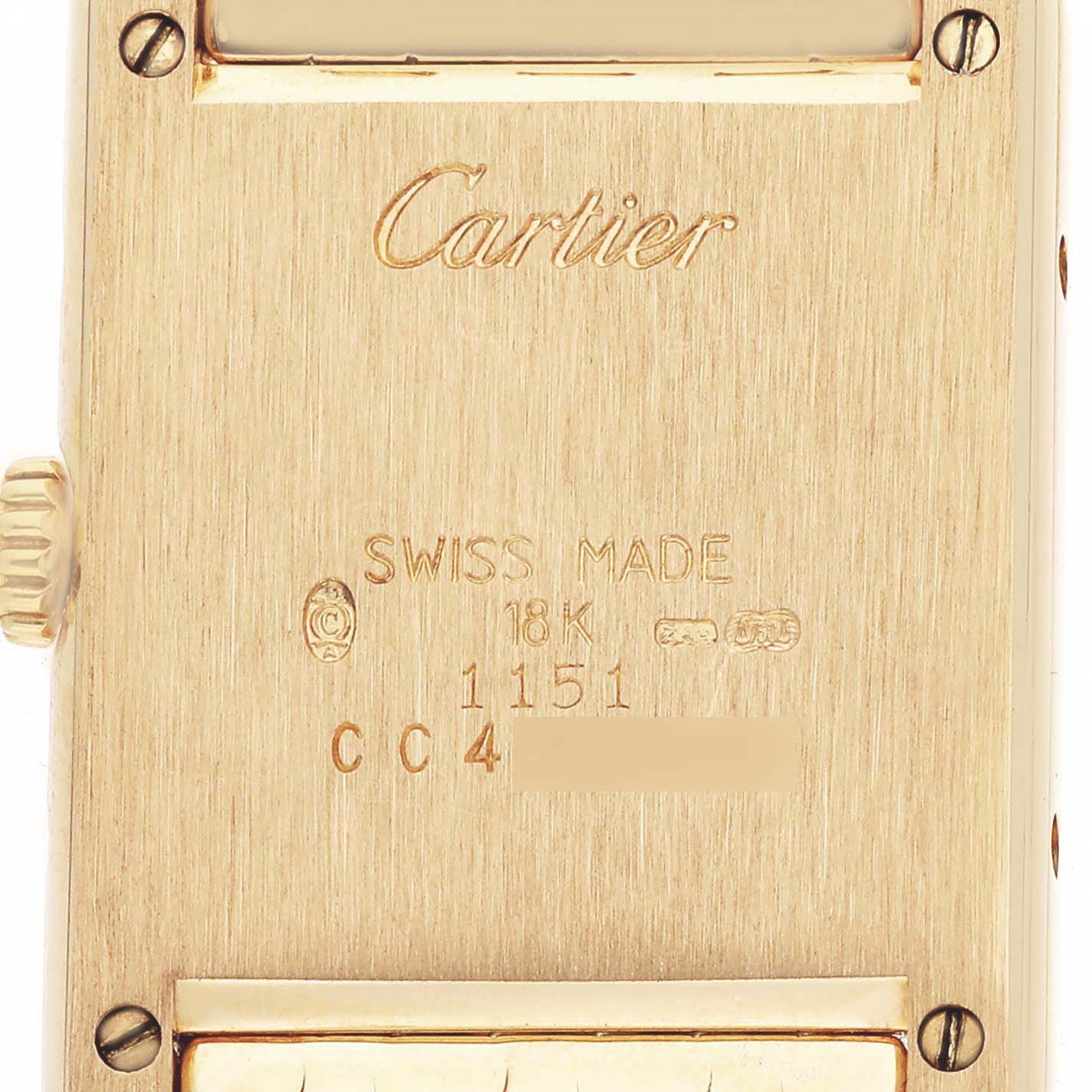 The image shows the back of a Cartier Tank Louis WA2013K3 Women's Yellow Gold Silver Dial WA2013K3 Women's Yellow Gold Silver Dial watch, highlighting the engraving and crown side.