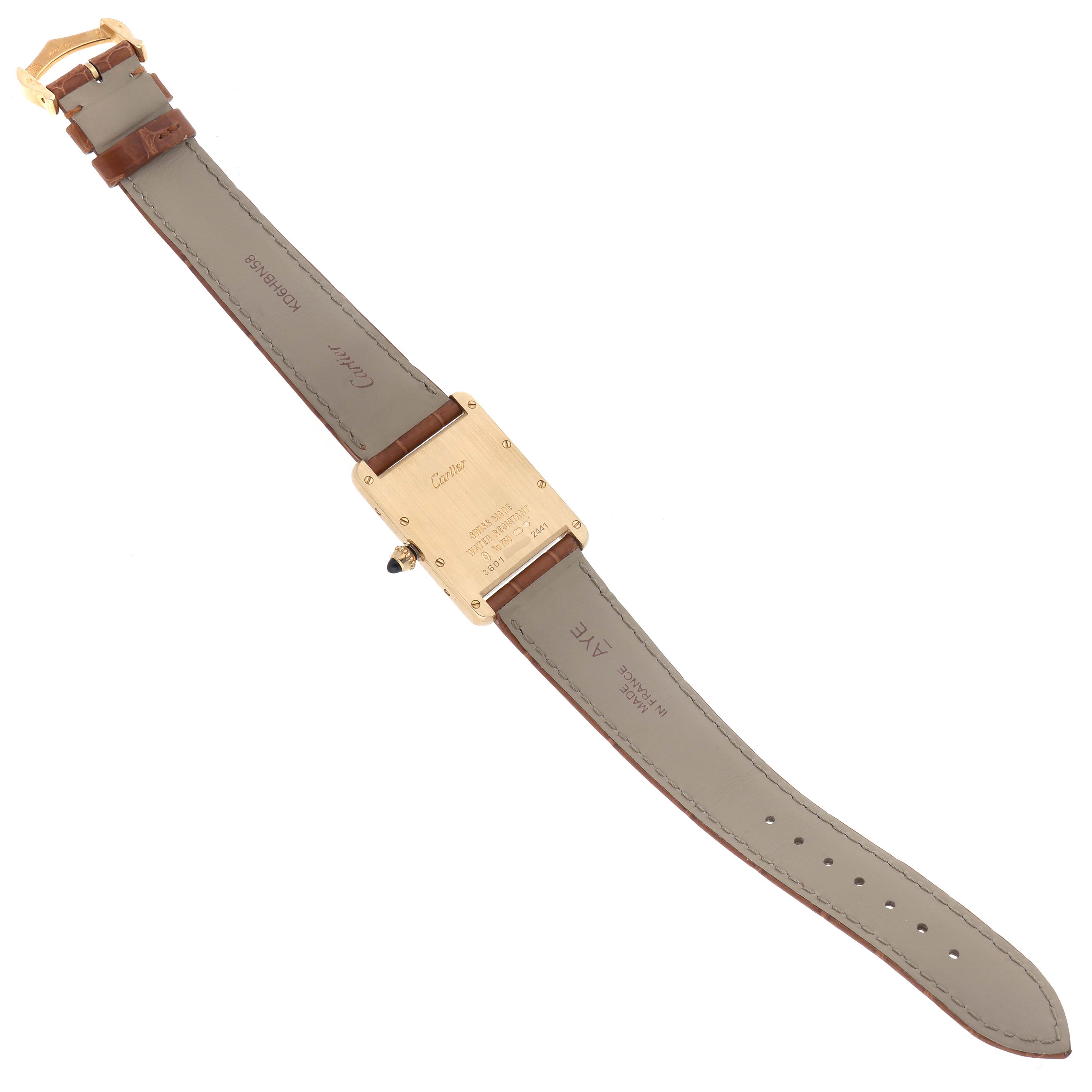 The Cartier Tank Louis W1529756 Men's Yellow Gold Silver Dial W1529756 Men's Yellow Gold Silver Dial watch is shown from the back, displaying the case back, strap, and buckle.