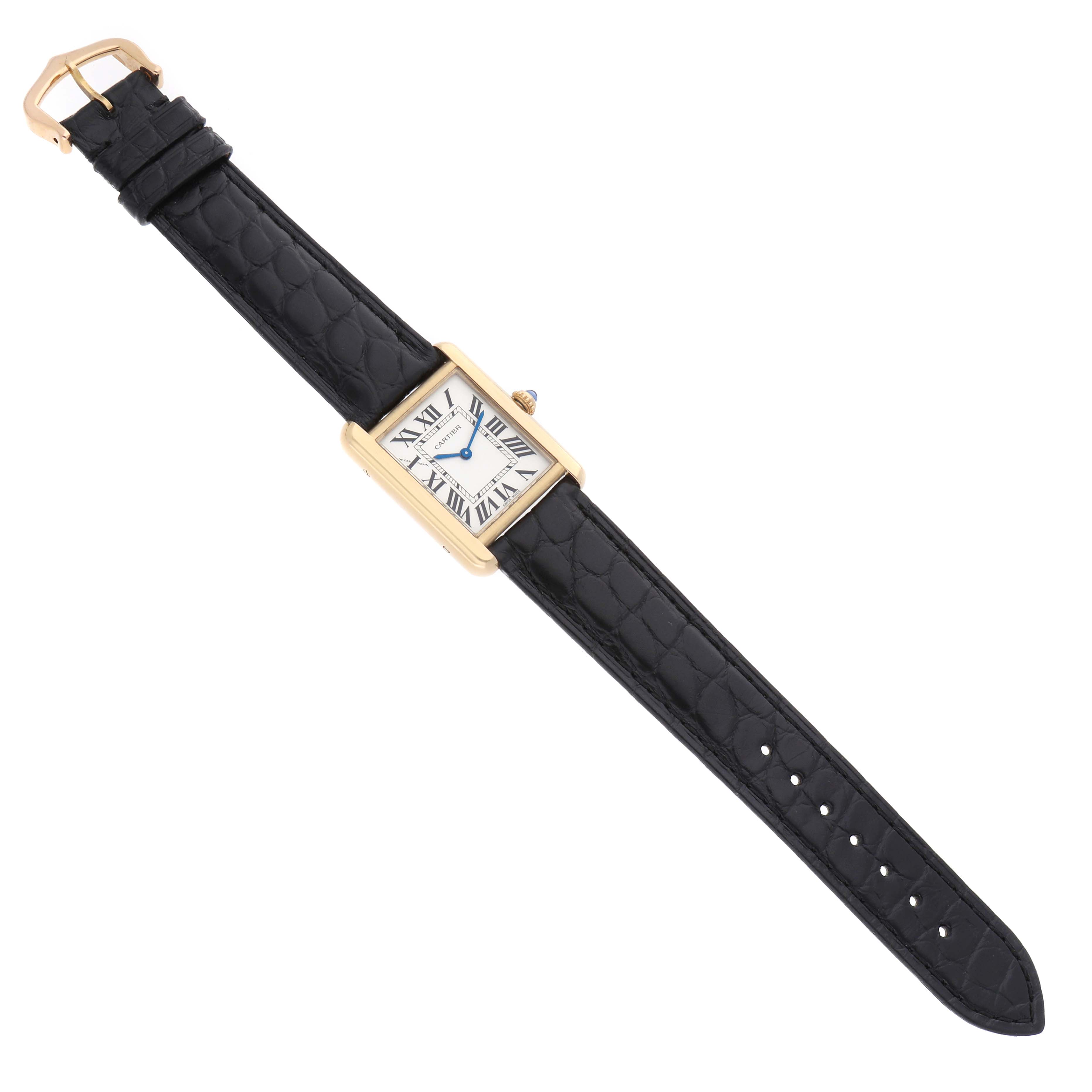 The Cartier Tank Solo W1018755 Women's Yellow Gold Silver Dial watch is shown at a slight angle, displaying its rectangular face, leather strap, and deployment clasp.