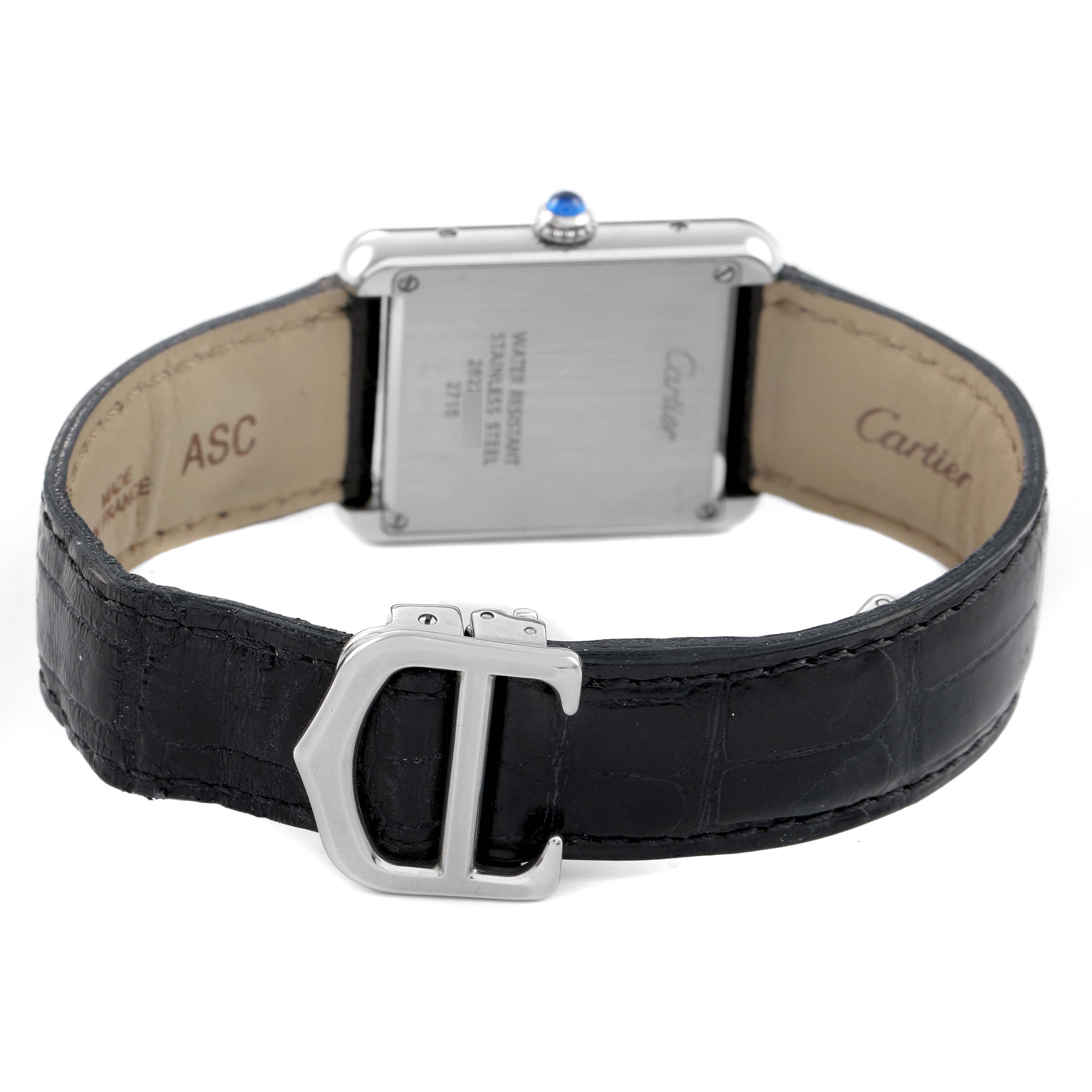 The image shows the back of the Cartier Tank Solo W1018255 Women's Stainless Steel Silver Dial watch, featuring the clasp, case back, and crown detail.