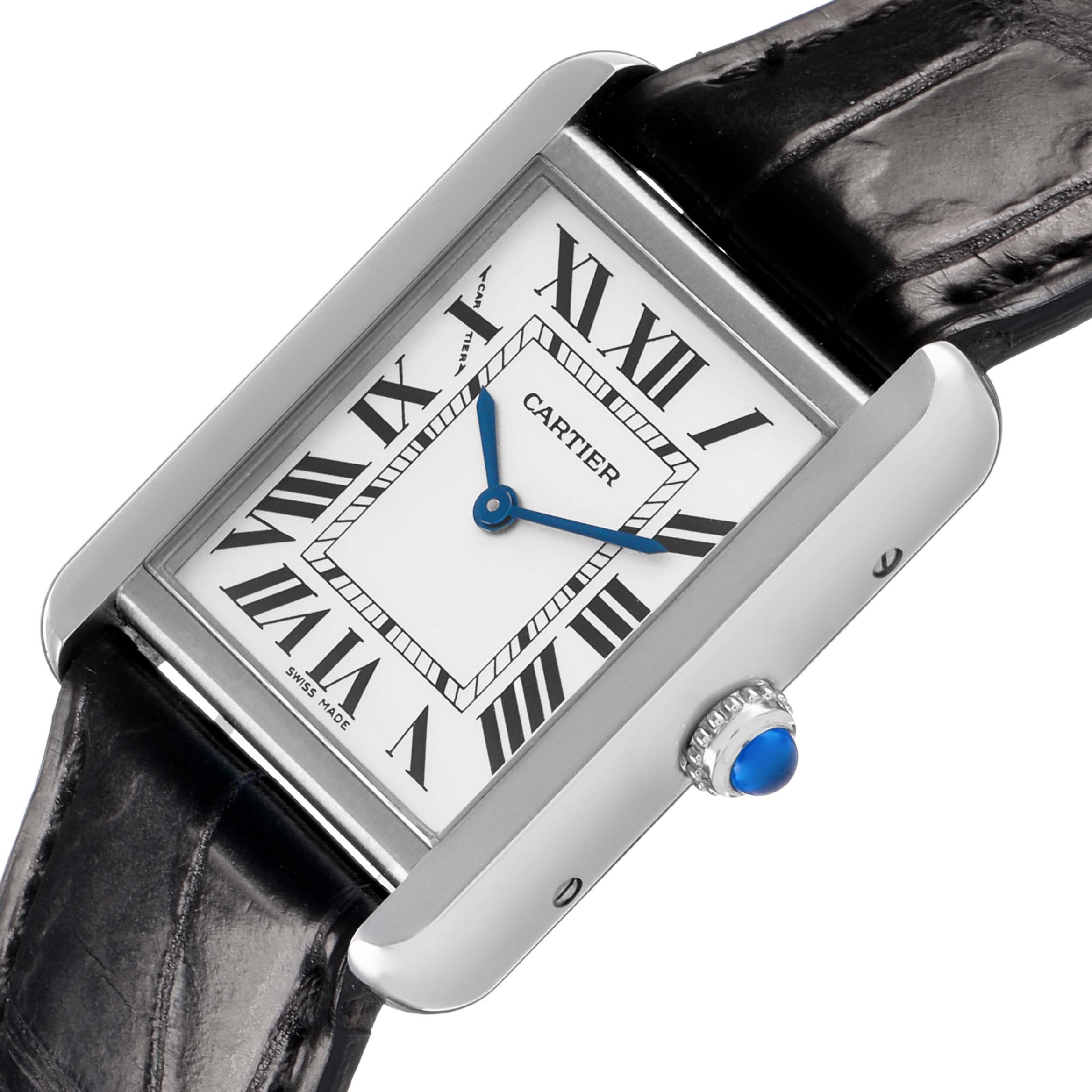 The Cartier Tank Solo W1018255 Women's Stainless Steel Silver Dial watch is shown from a front angle, highlighting the dial, Roman numerals, leather strap, and the blue spinel crown.