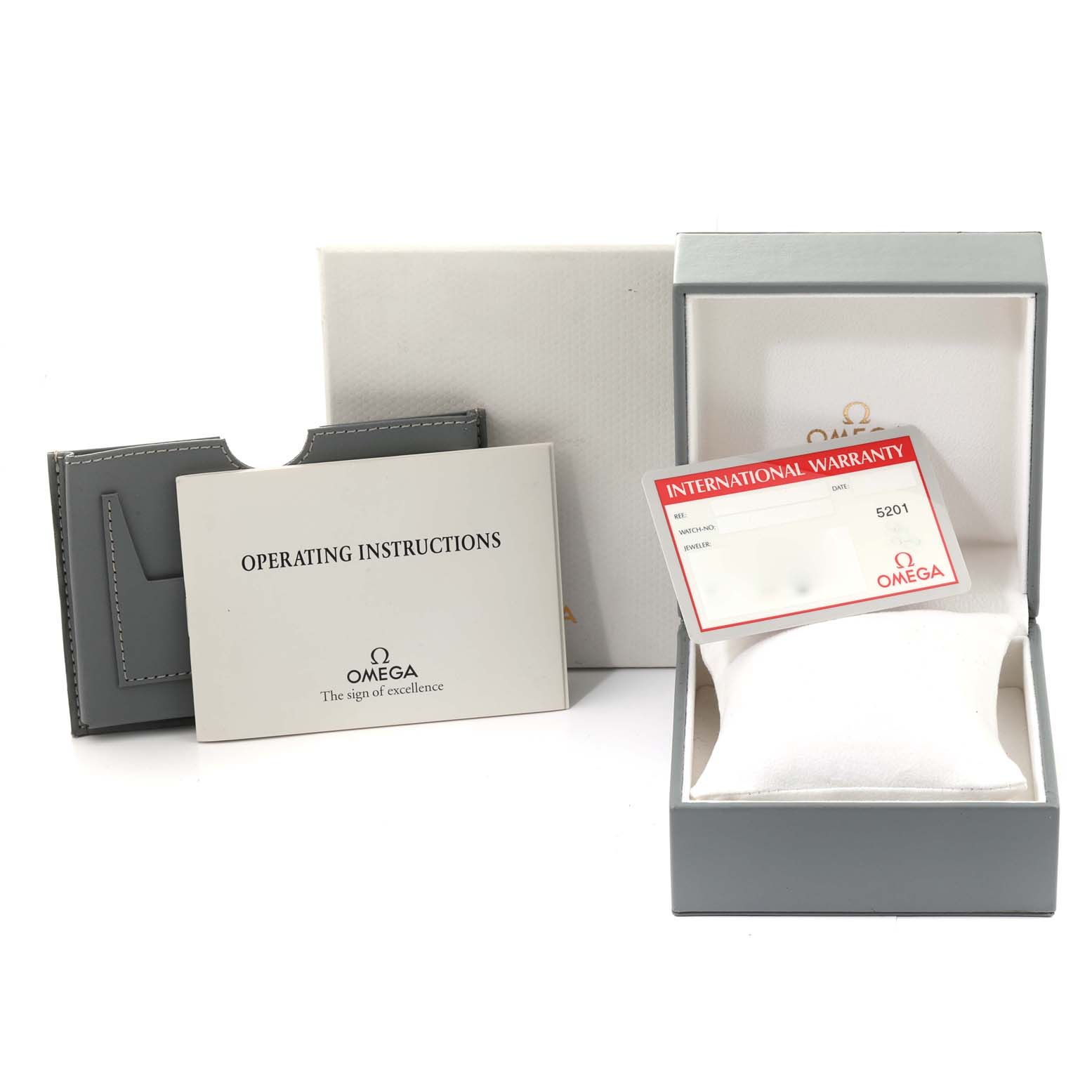 The image shows the operating instructions, warranty card, and original packaging for the Omega Seamaster 2561.80.00 Men
s Stainless Steel Blue Dial 2561.80.00 Men
s Stainless Steel Blue Dial watch.