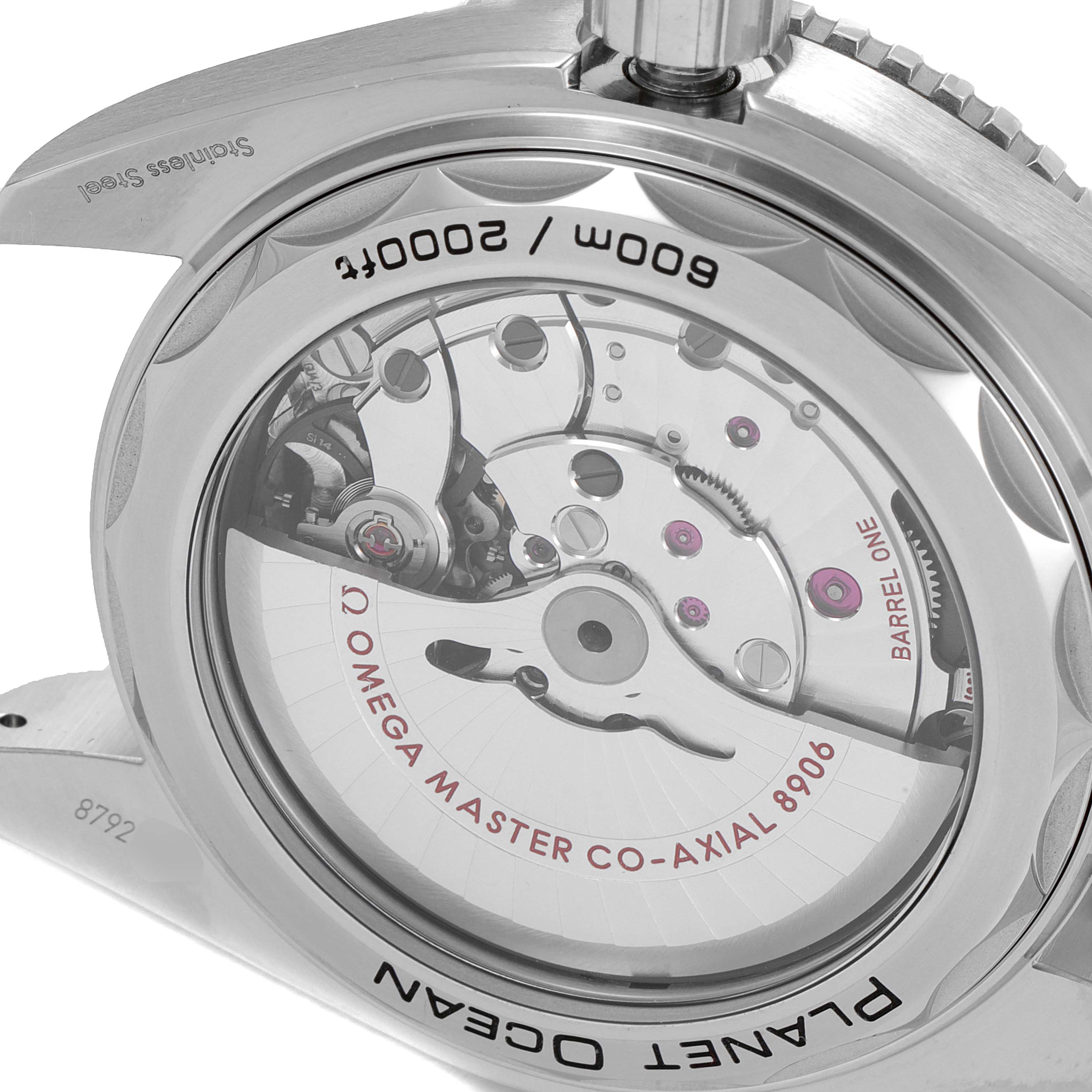 This image shows the backside view of the Omega Planet Ocean 215.33.44.22.03.001 Men's Stainless Steel Black Dial 215.33.44.22.03.001 Men's Stainless Steel Black Dial watch, revealing the movement mechanism through the transparent case back.