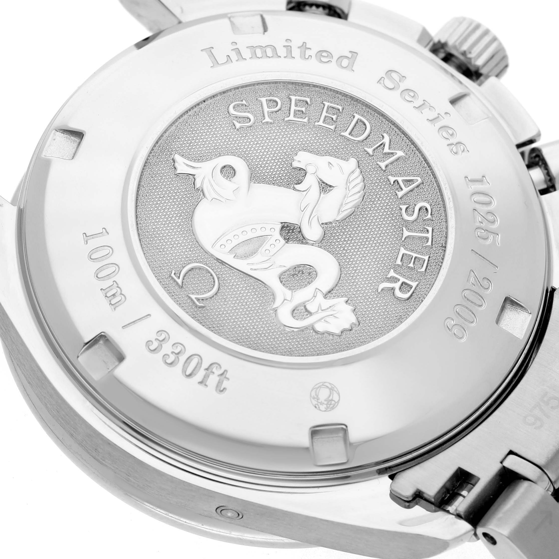 The image shows the back case of an Omega Speedmaster 323.30.40.40.02.001 Men's Stainless Steel White Dial, featuring a limited series engraving and depth rating.