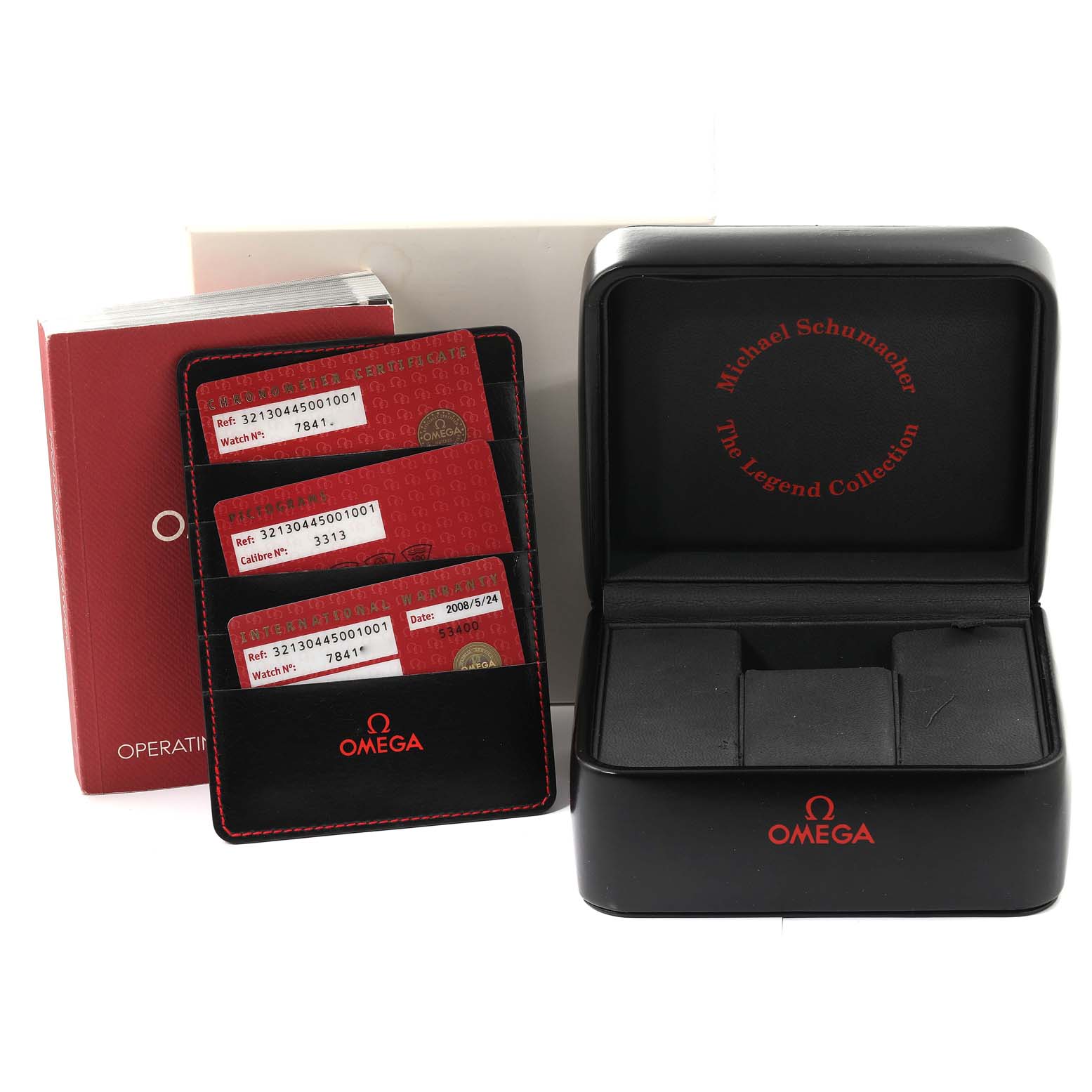 The image shows the packaging, warranty cards, and case for an Omega Speedmaster 321.30.44.50.01.001 Men
s Stainless Steel Black Dial 321.30.44.50.01.001 Men
s Stainless Steel Black Dial watch, Michael Schumacher edition.