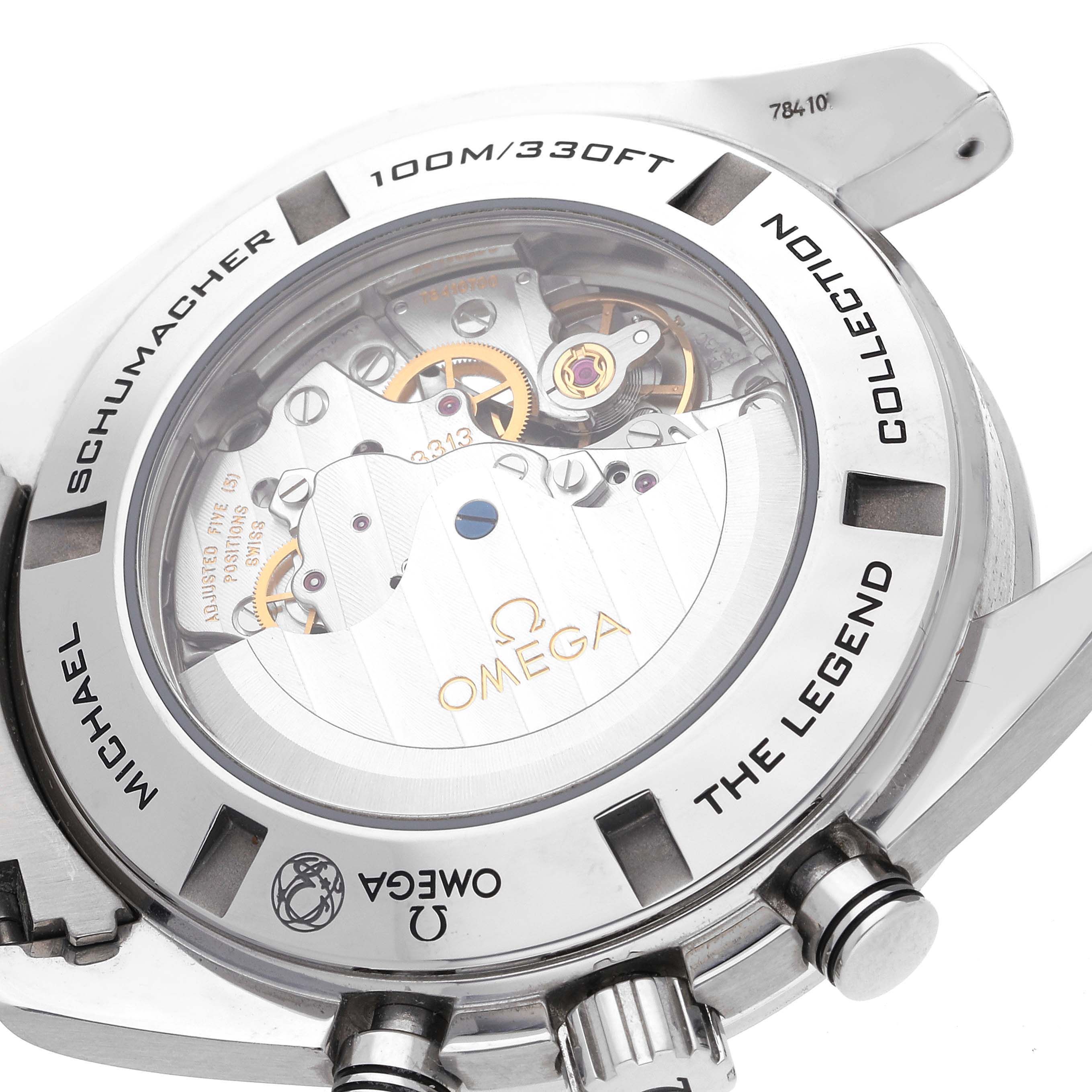 This image shows the back case of the Omega Speedmaster 321.30.44.50.01.001 Men
s Stainless Steel Black Dial 321.30.44.50.01.001 Men
s Stainless Steel Black Dial watch, highlighting its internal mechanism and inscriptions.