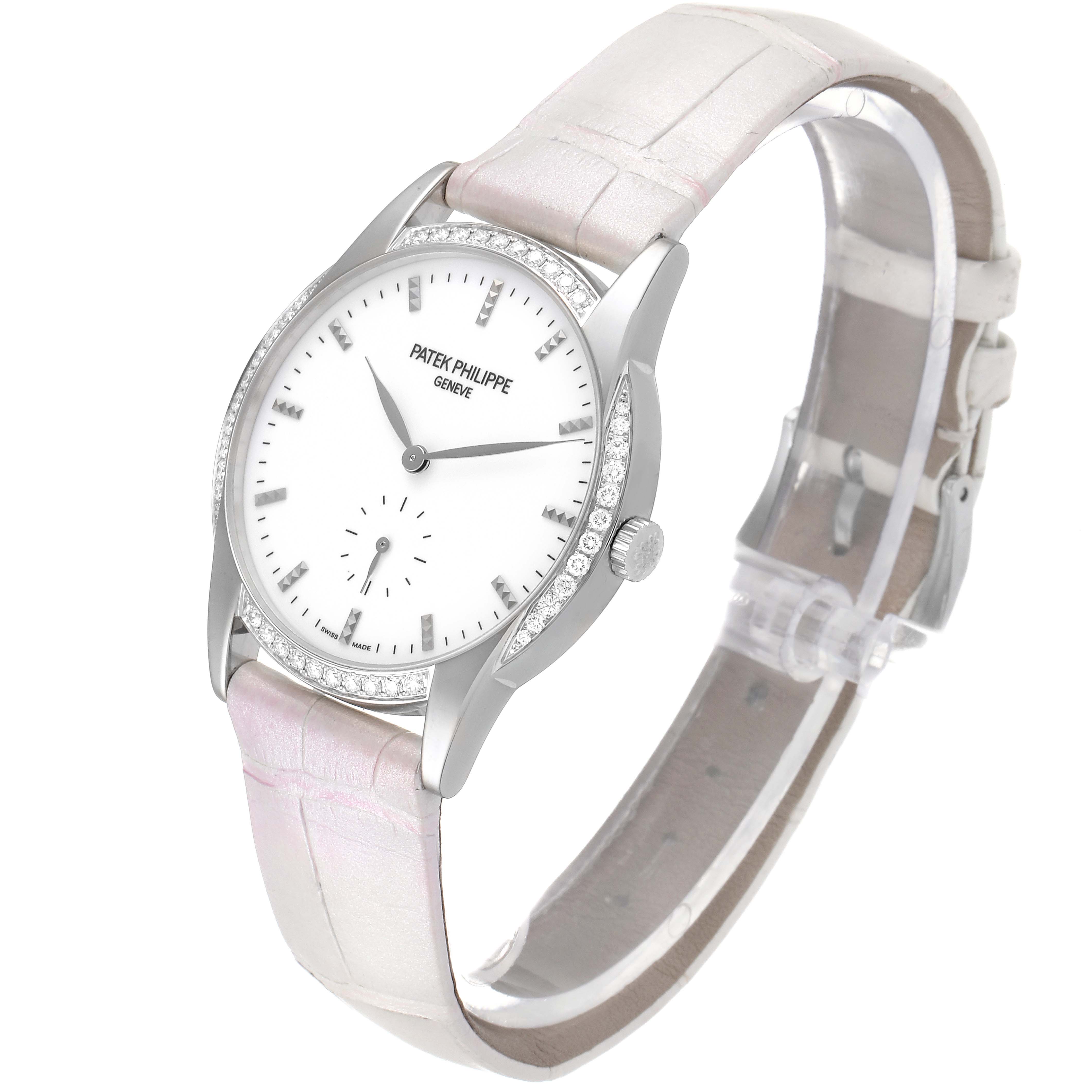 The Patek Philippe Calatrava 7122/200G Women's White Gold White Dial 7122/200G Women's White Gold White Dial watch is shown at a slight angle, displaying its face, bezel, case, and part of the leather strap.