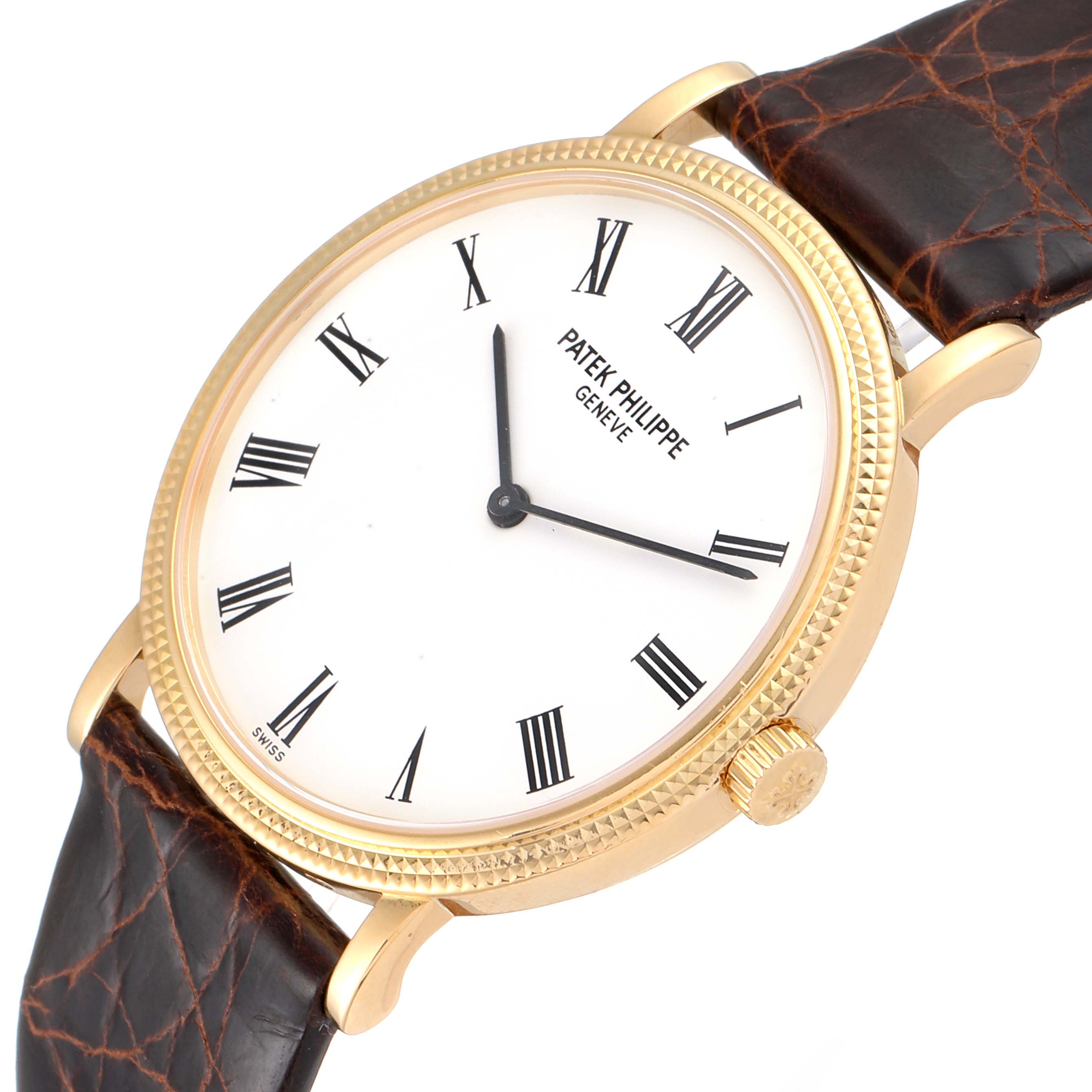 The image shows a close-up angle of the Patek Philippe Calatrava 5120J Men's Yellow Gold White Dial 5120J Men's Yellow Gold White Dial watch, highlighting its face, bezel, crown, and leather strap.
