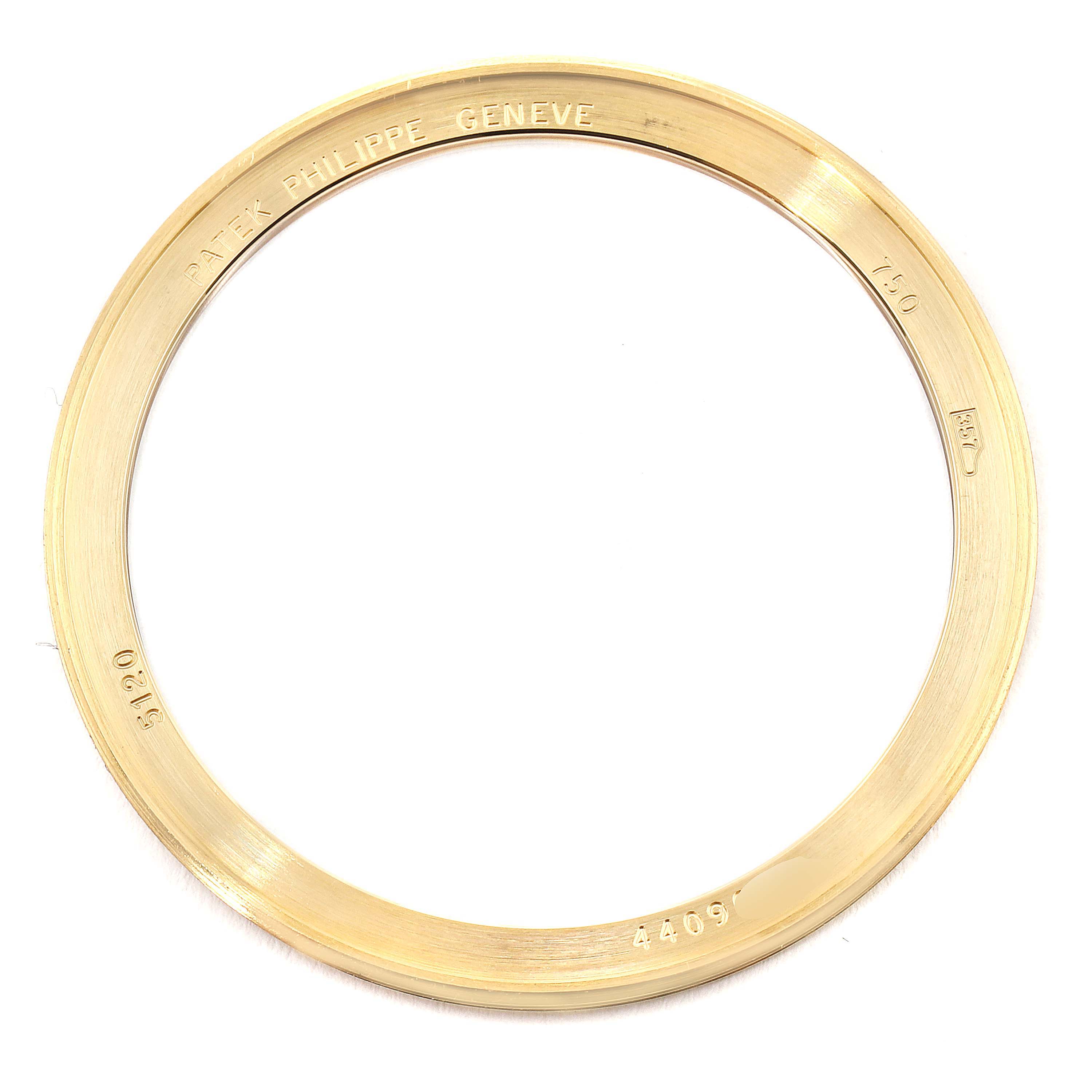 This is a top-down view of the bezel for a Patek Philippe Calatrava 5120J Men's Yellow Gold White Dial 5120J Men's Yellow Gold White Dial watch.