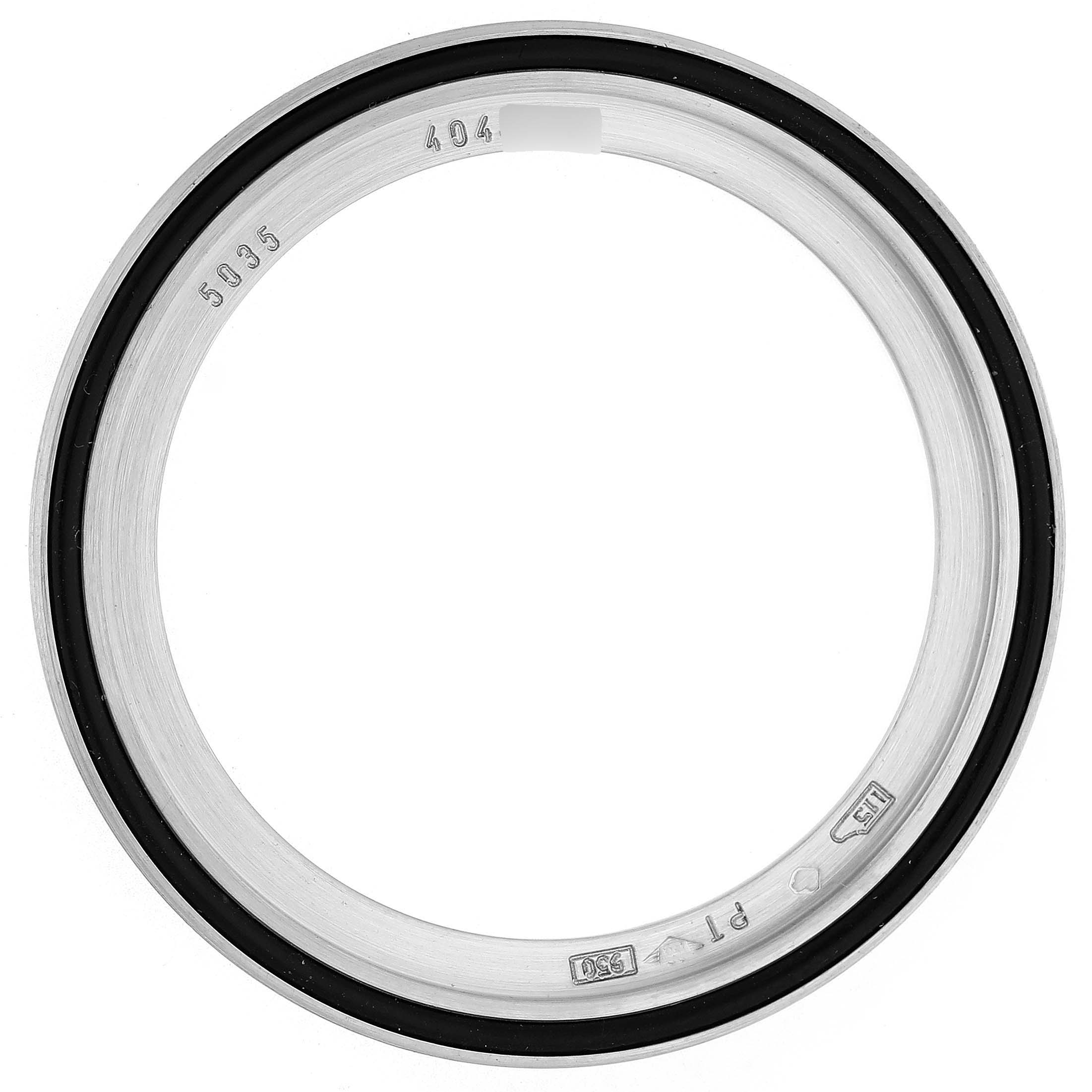 The image shows a Patek Philippe Complications 5035G Men's White Gold Black Dial model case bezel from a top-down angle, highlighting its inner markings.