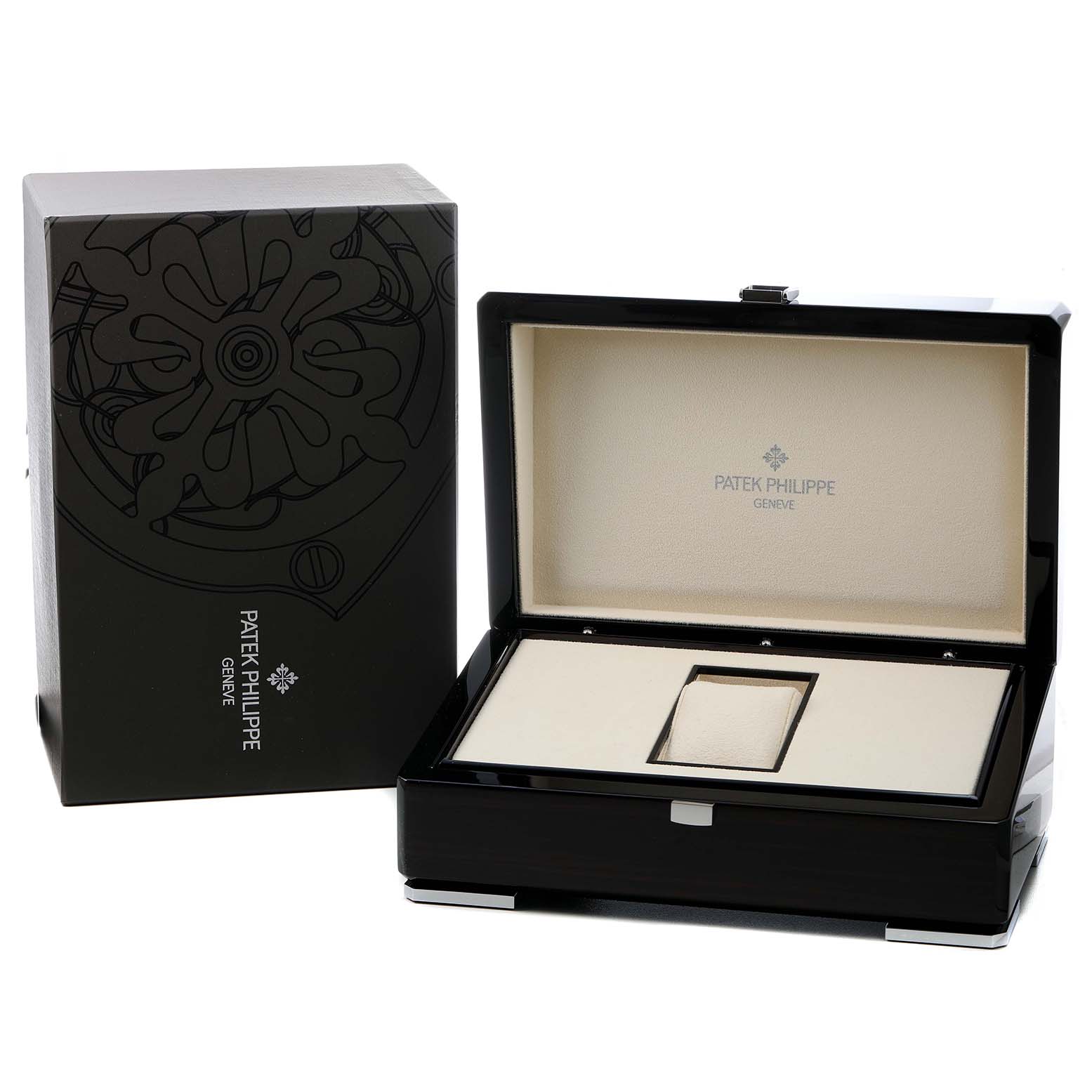 The image shows the open box and packaging for a Patek Philippe Complications 5035G Men's White Gold Black Dial watch, revealing an elegant interior.