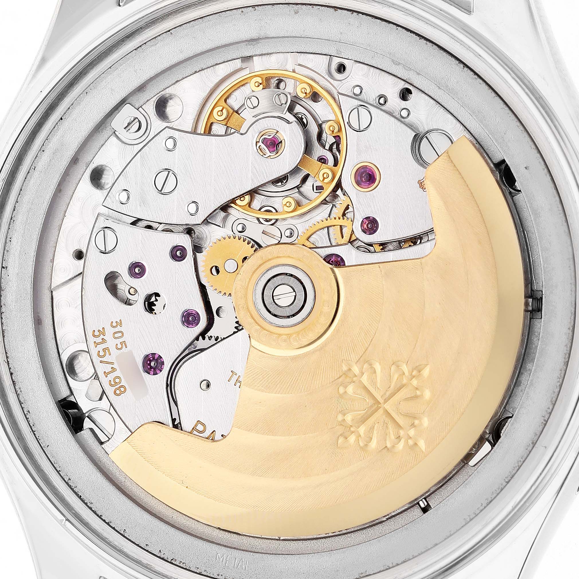 The image shows the back of a Patek Philippe Complications 5035G Men's White Gold Black Dial watch, highlighting its exposed mechanical movement and rotor.