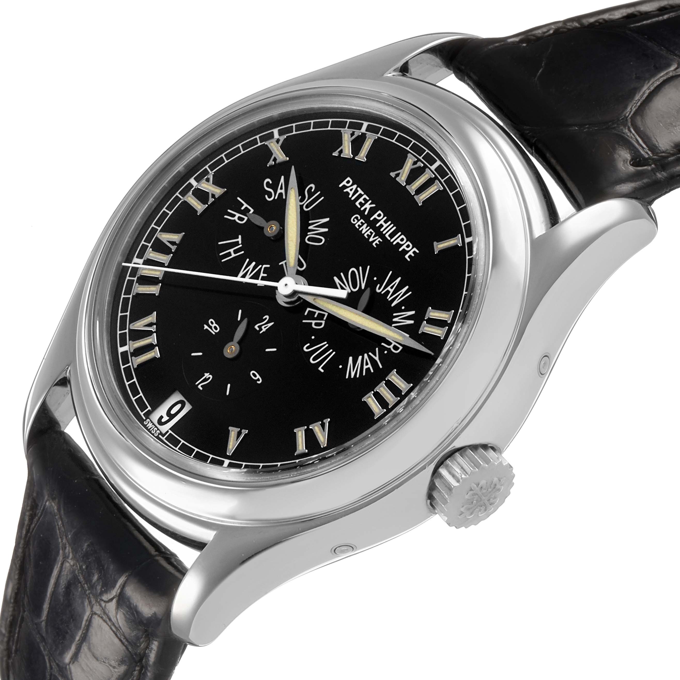 The Patek Philippe Complications 5035G Men's White Gold Black Dial watch is shown at an angle, highlighting the dial, case, crown, and leather strap.