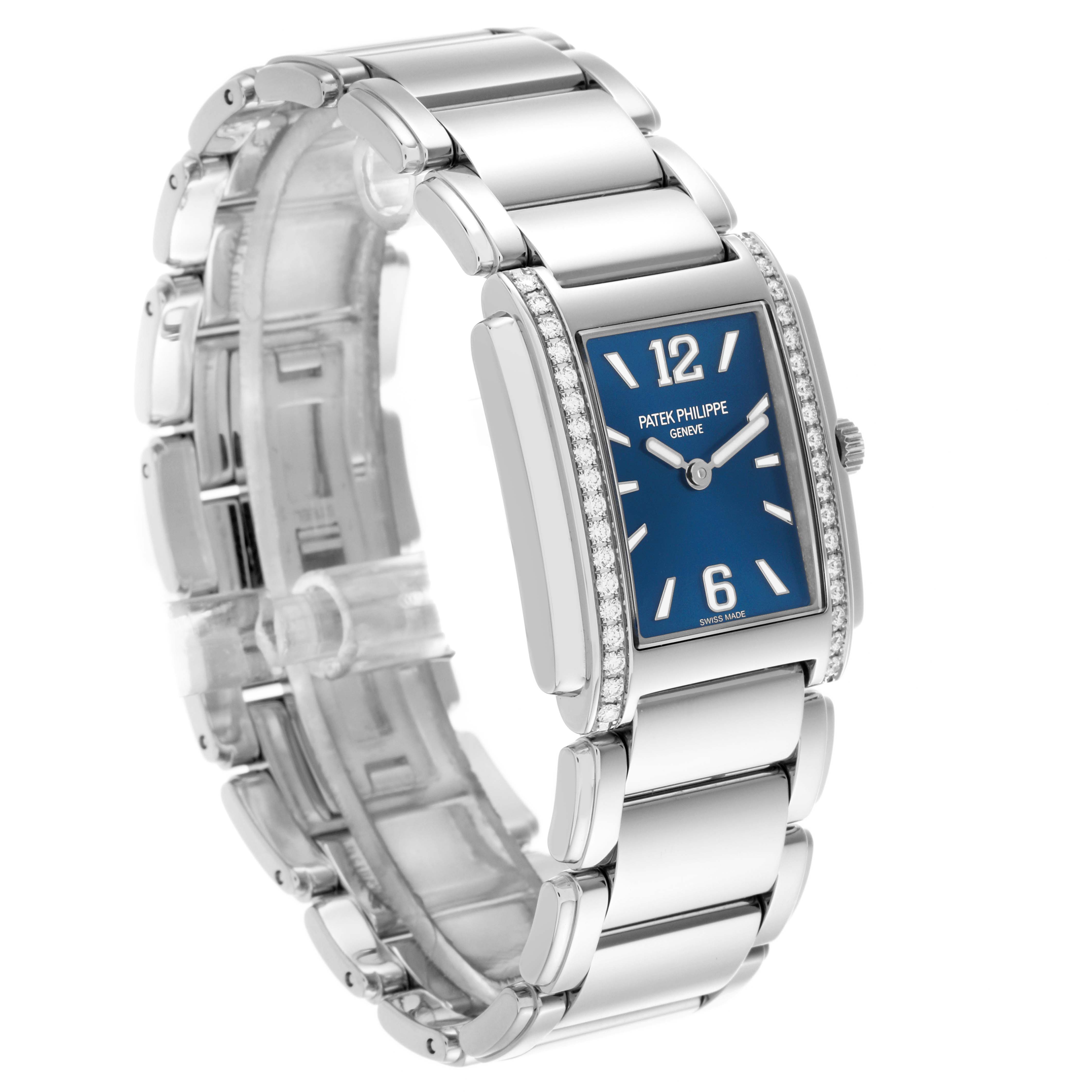 The Patek Philippe Twenty-4 4910/1200A-001 Women's Stainless Steel Blue Dial 4910/1200A-001 Women's Stainless Steel Blue Dial watch is shown at a slight angle, displaying its bracelet, side, and face with a blue dial.