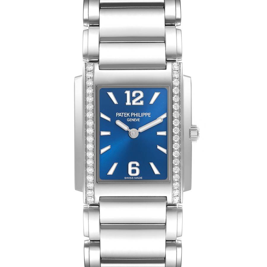 This Patek Philippe Twenty-4 watch shows a front view with a blue dial, diamond-set bezel, and silver bracelet.