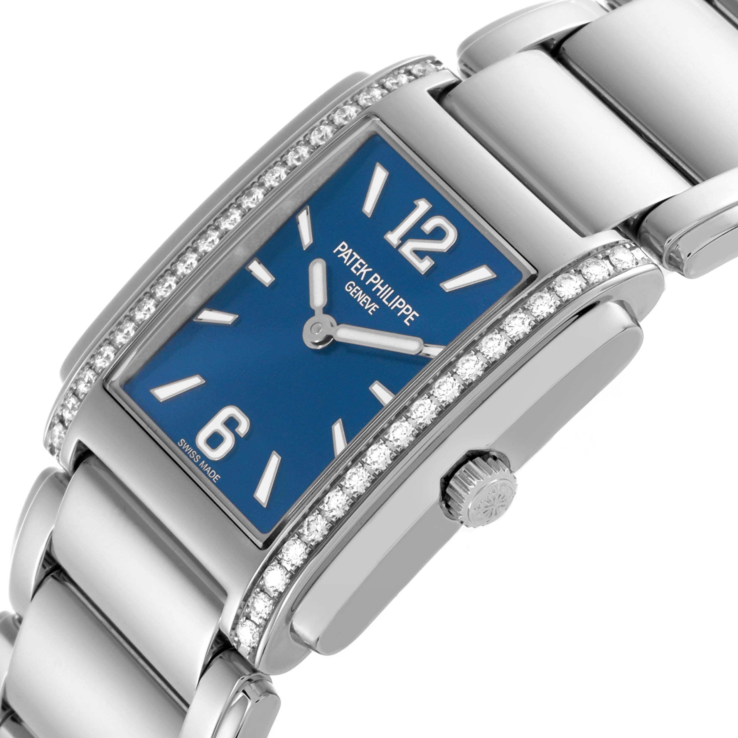 The Patek Philippe Twenty-4 4910/1200A-001 Women's Stainless Steel Blue Dial 4910/1200A-001 Women's Stainless Steel Blue Dial watch is shown at an angled view featuring the bracelet, crown, and diamond-accented bezel.