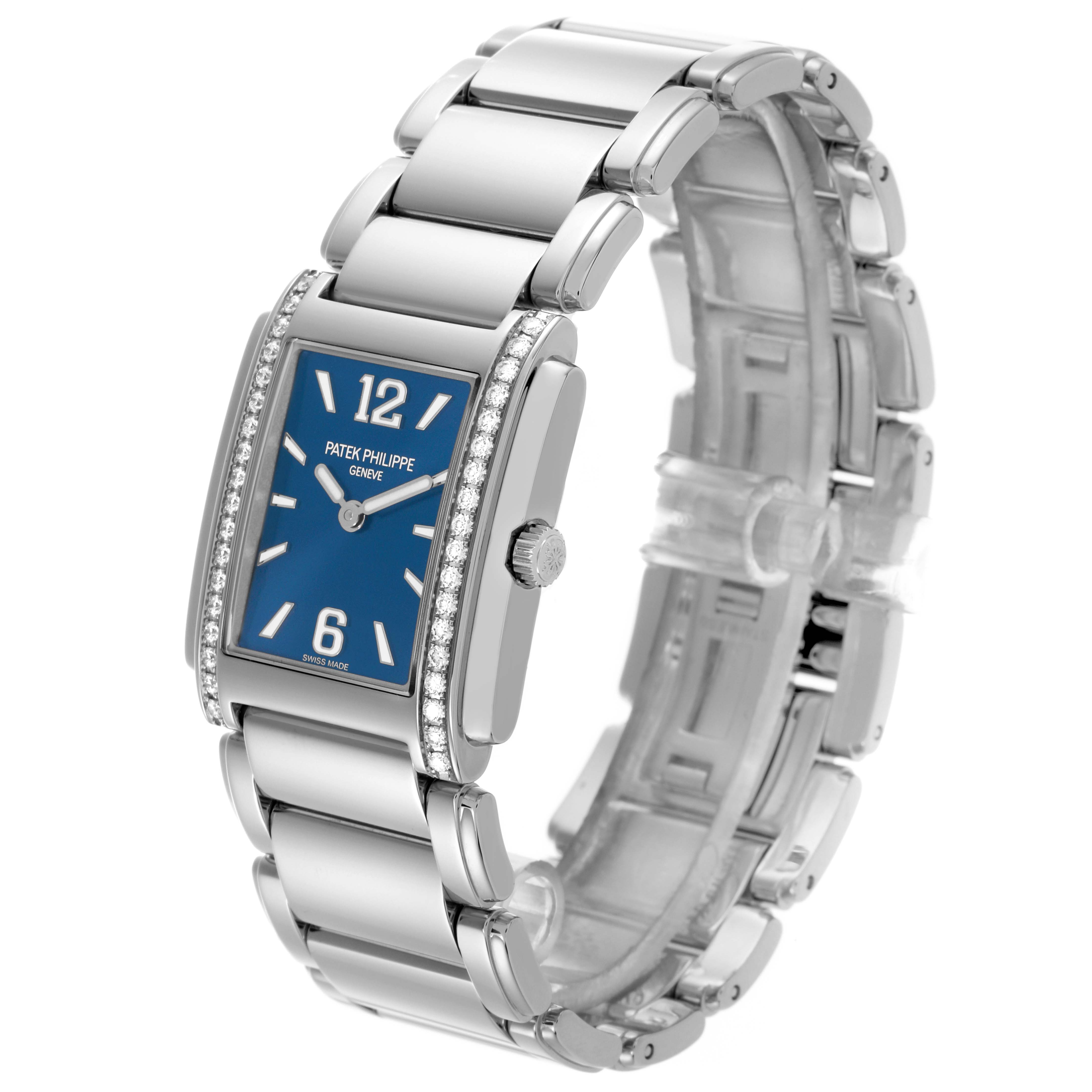 The Patek Philippe Twenty-4 4910/1200A-001 Women's Stainless Steel Blue Dial 4910/1200A-001 Women's Stainless Steel Blue Dial watch is shown at a three-quarter angle, highlighting the rectangular face, bracelet, and side crown.