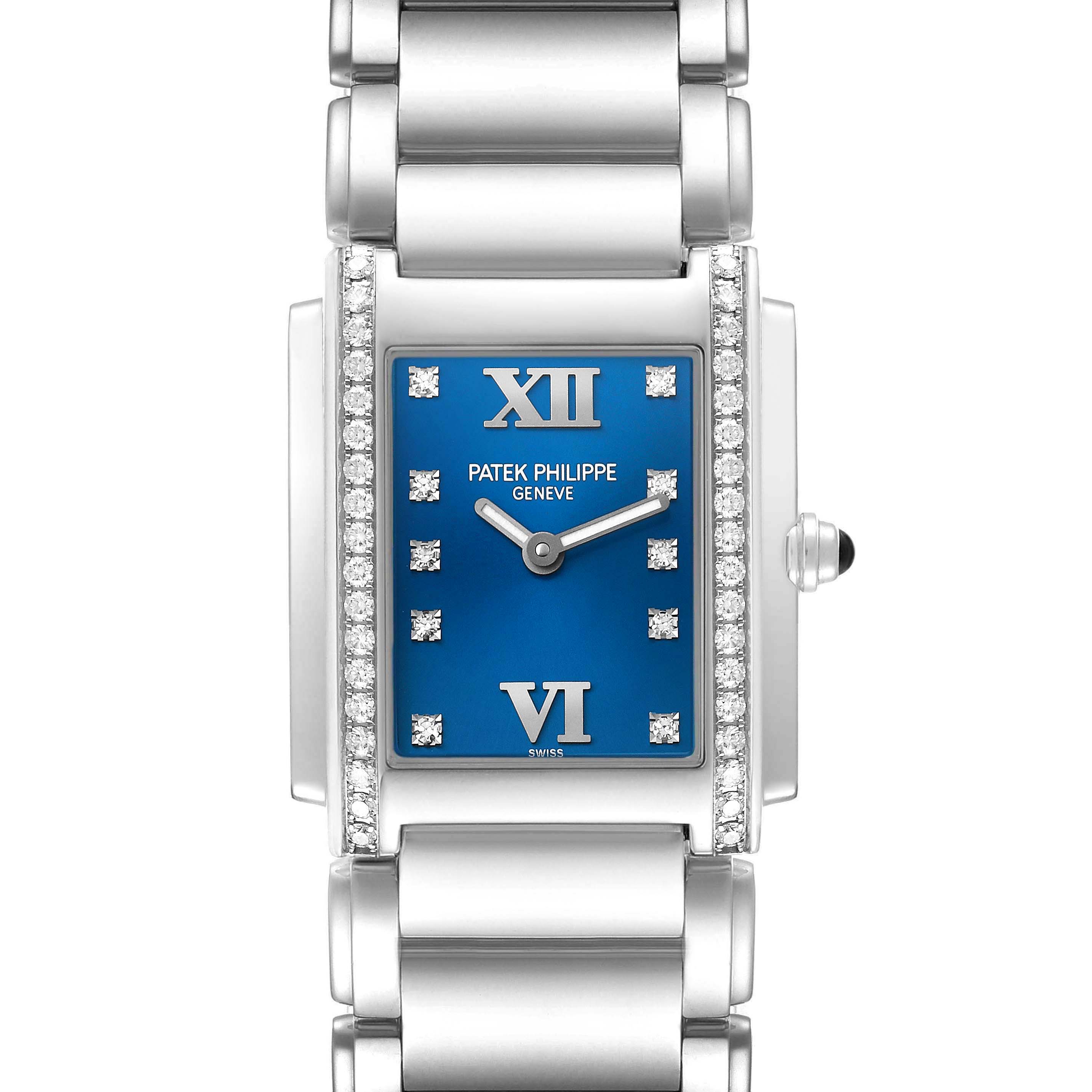 The Patek Philippe Twenty-4 4910/10A Women's Stainless Steel Blue Dial watch is shown from a top-down angle, featuring the face, crown, and part of the bracelet.