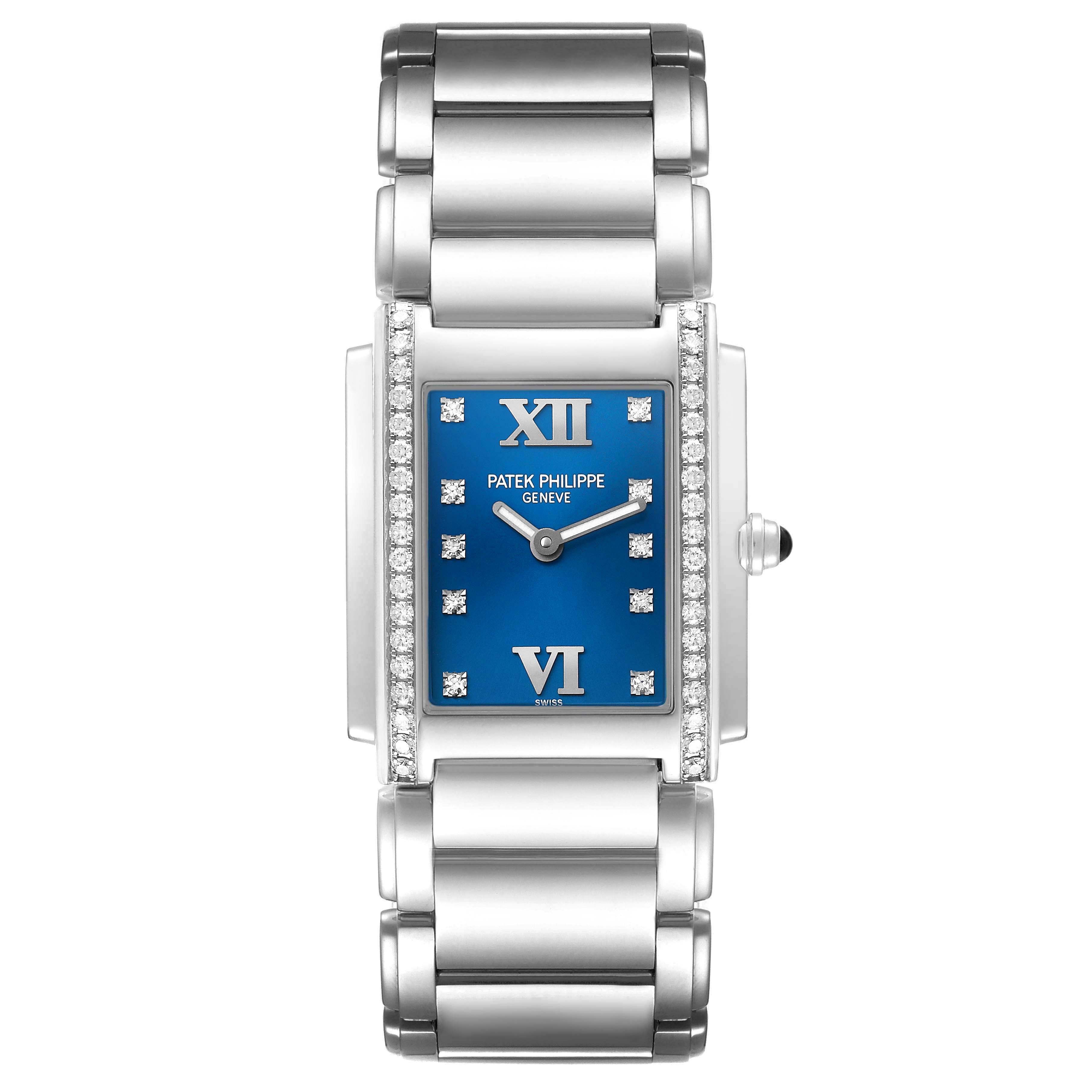 The Patek Philippe Twenty-4 4910/10A Women's Stainless Steel Blue Dial watch is shown from a top view, highlighting its blue dial, diamond accents, and metal bracelet.