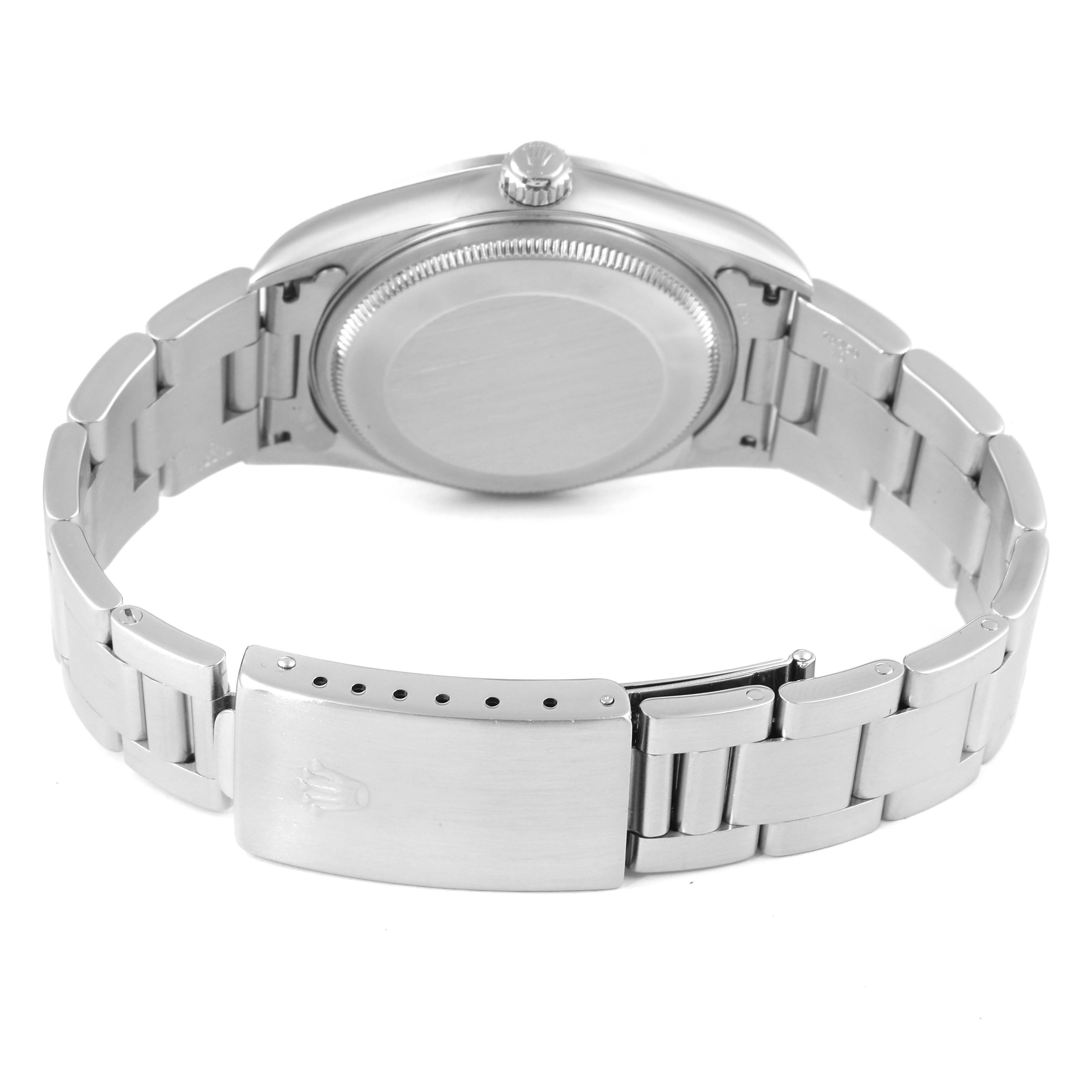 The image shows the back view of a Rolex Air-King 14000 Men's Stainless Steel Silver Dial 14000 Men's Stainless Steel Silver Dial watch, highlighting the case back, crown, and stainless steel bracelet with a clasp.