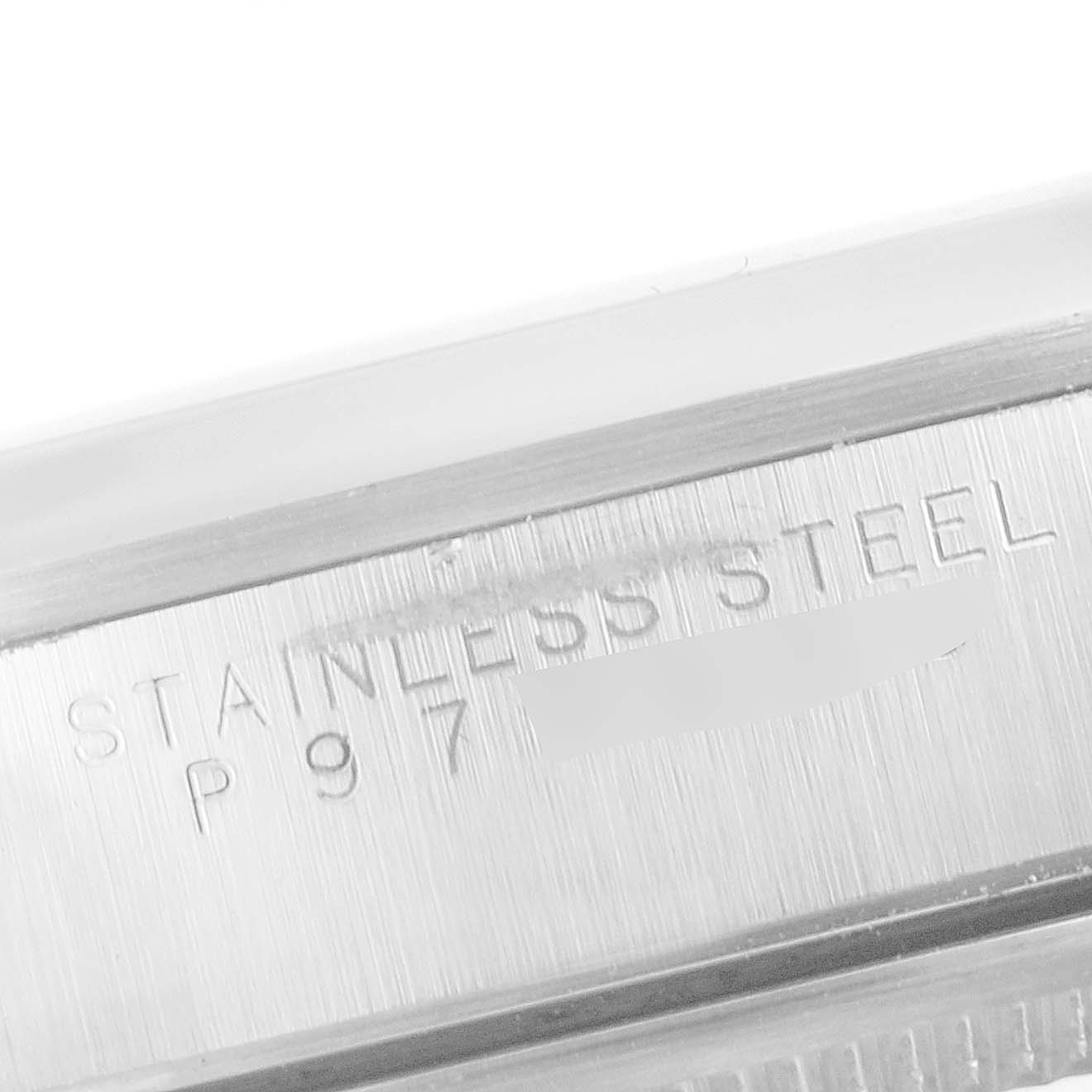 This is a close-up of the case side of the Rolex Air-King 14000 Men's Stainless Steel Silver Dial 14000 Men's Stainless Steel Silver Dial, showing the "STAINLESS STEEL" engraving.