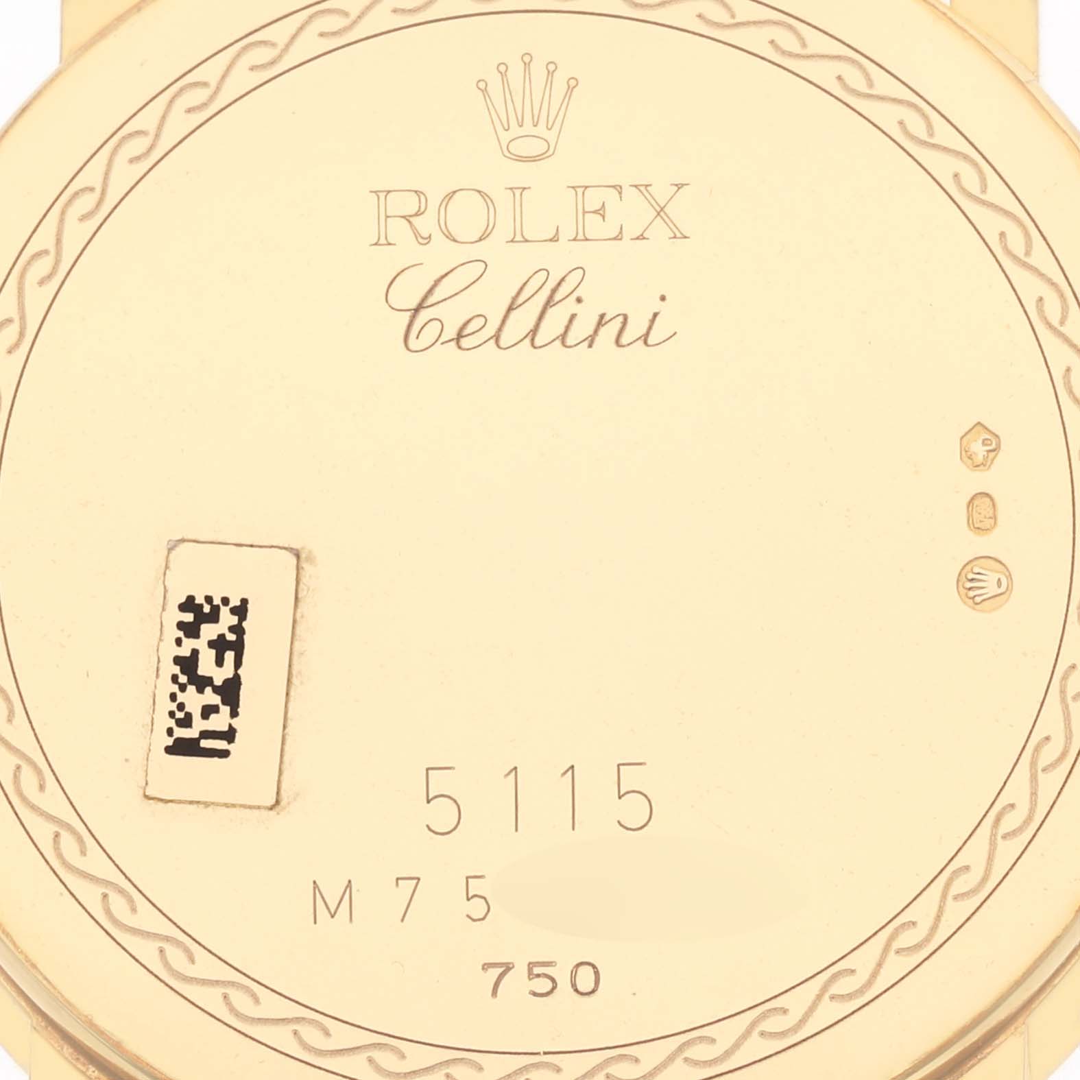 The image shows the back case of a Rolex Cellini 5115 Men's Yellow Gold Grey Dial 5115 Men's Yellow Gold Grey Dial watch, displaying the brand logo, model details, and hallmarks.