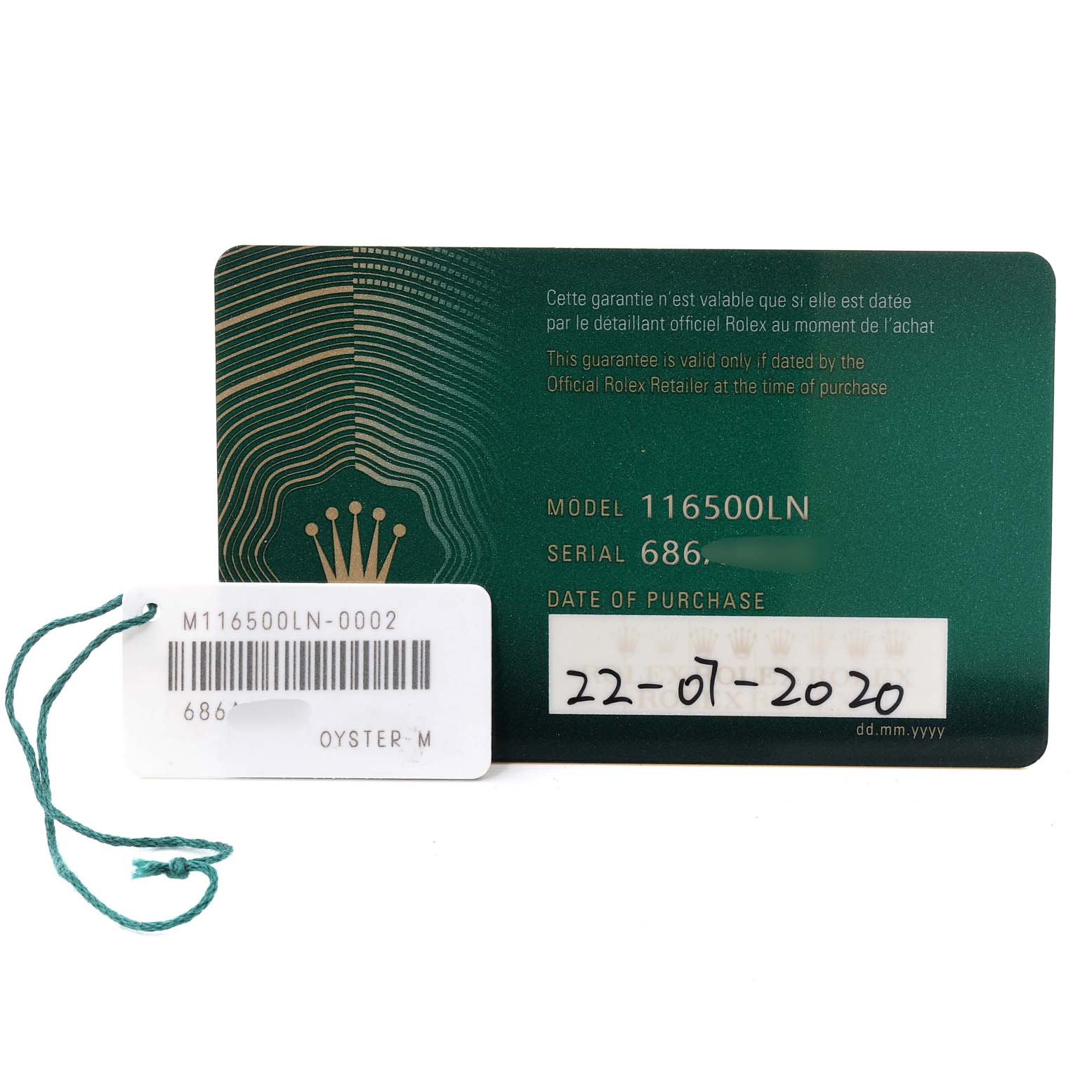 The image shows the warranty card and tag for a Rolex Daytona 116500 Men
s Stainless Steel Black Dial 116500 Men
s Stainless Steel Black Dial model 116500LN, with purchase date included.