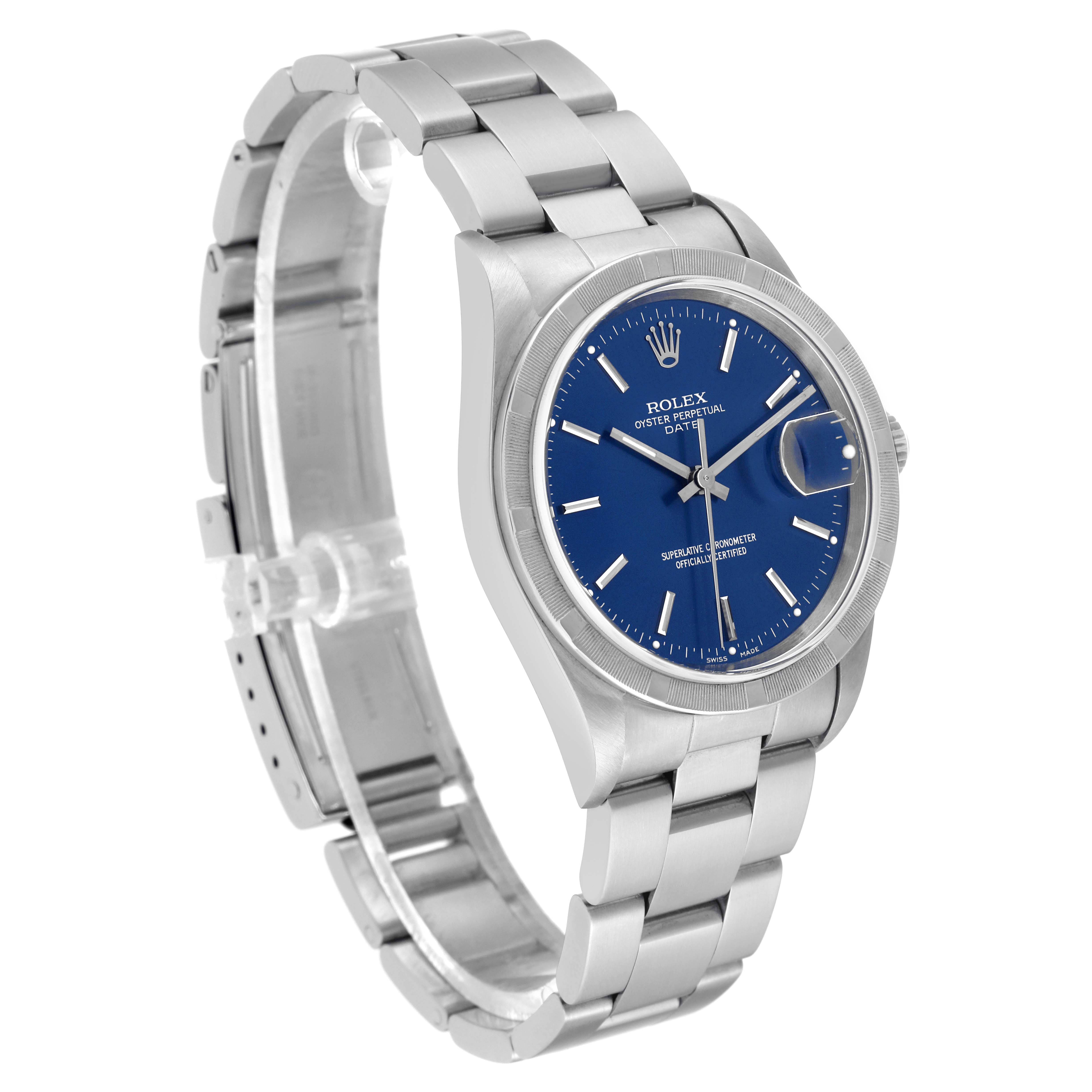 The image shows a Rolex Date 15210 Men's Stainless Steel Blue Dial 15210 Men's Stainless Steel Blue Dial model watch at a three-quarter angle, highlighting the blue dial, date magnifier, and stainless steel bracelet.