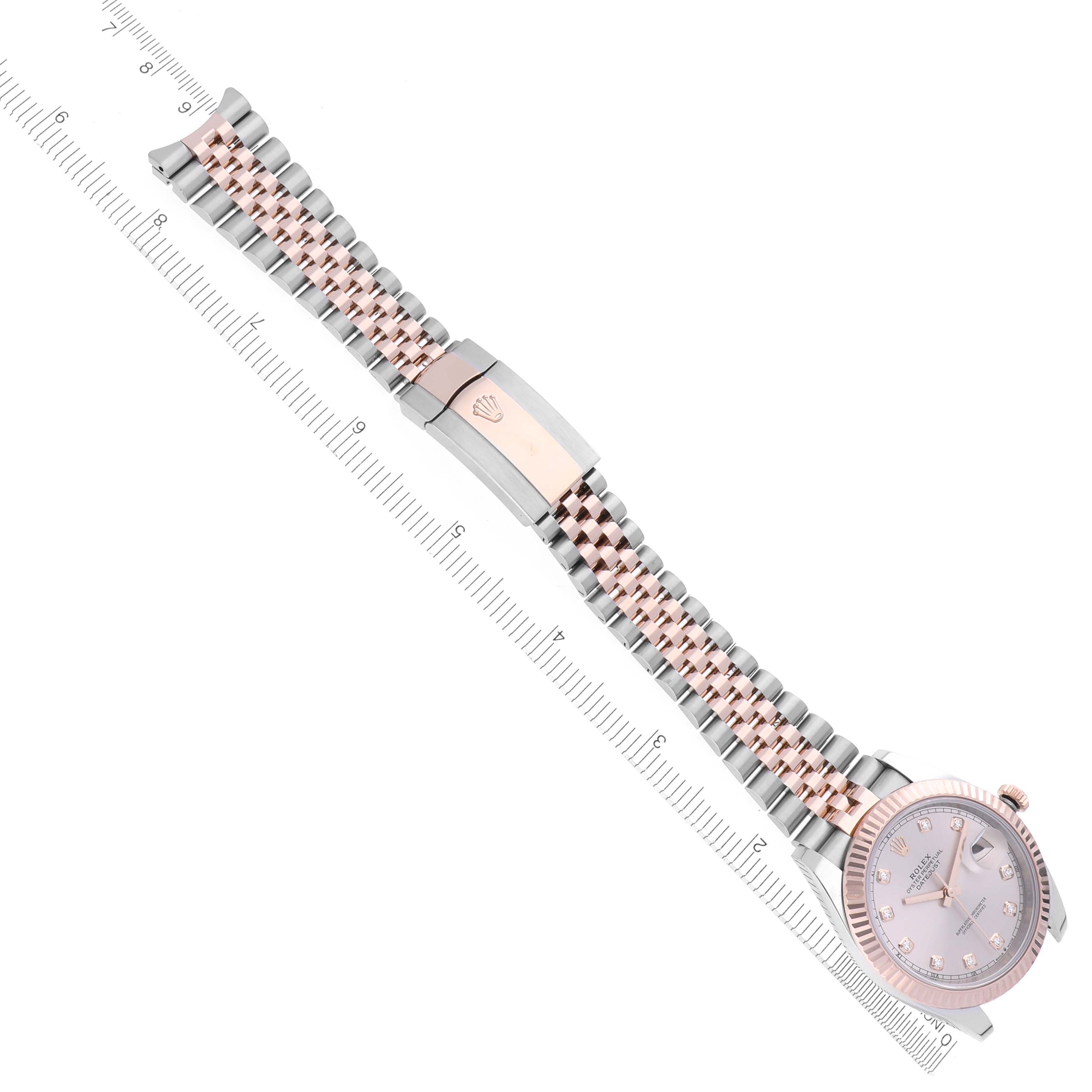 The Rolex Datejust 41 126331 Men's Steel and Gold (two tone) Pink Dial 126331 Men's Steel and Gold (two tone) Pink Dial is shown from a top view, highlighting its two-tone jubilee bracelet, clasp, and face.