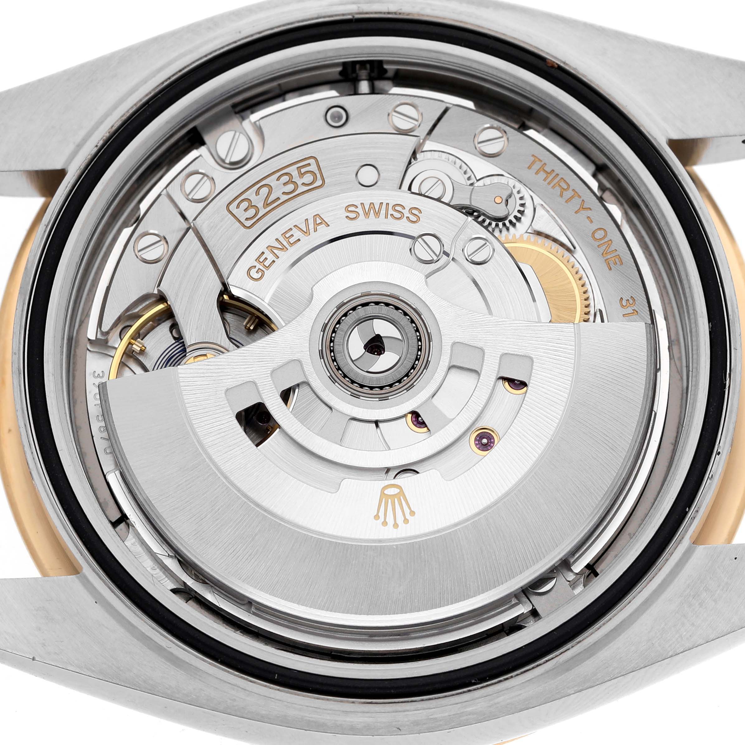 The image shows the movement of a Rolex Datejust 41 126303 Men's Steel and Gold (two tone) Grey Dial, highlighting the mechanism from a rear angle.
