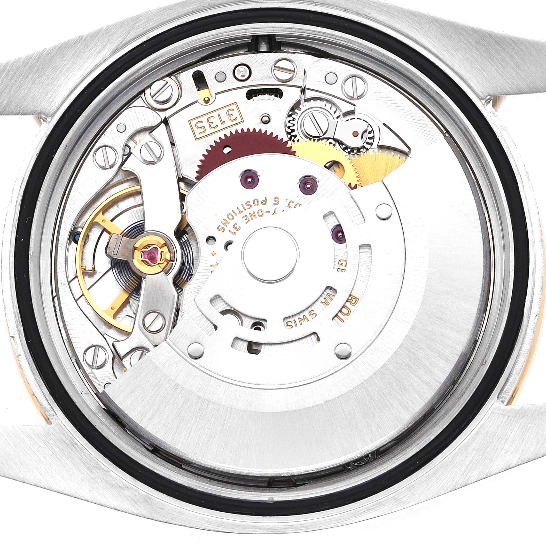 The image shows the internal mechanism of a Rolex Datejust 116243 Men's Steel and Gold (two tone) Champagne Dial 116243 Men's Steel and Gold (two tone) Champagne Dial watch from a back view, displaying gears and other components.