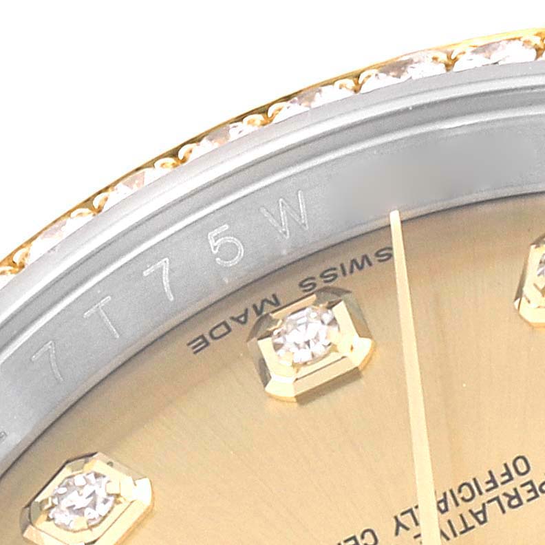 The image shows a close-up angle of the bezel, dial, and diamonds of a Rolex Datejust 116243 Men's Steel and Gold (two tone) Champagne Dial 116243 Men's Steel and Gold (two tone) Champagne Dial watch.