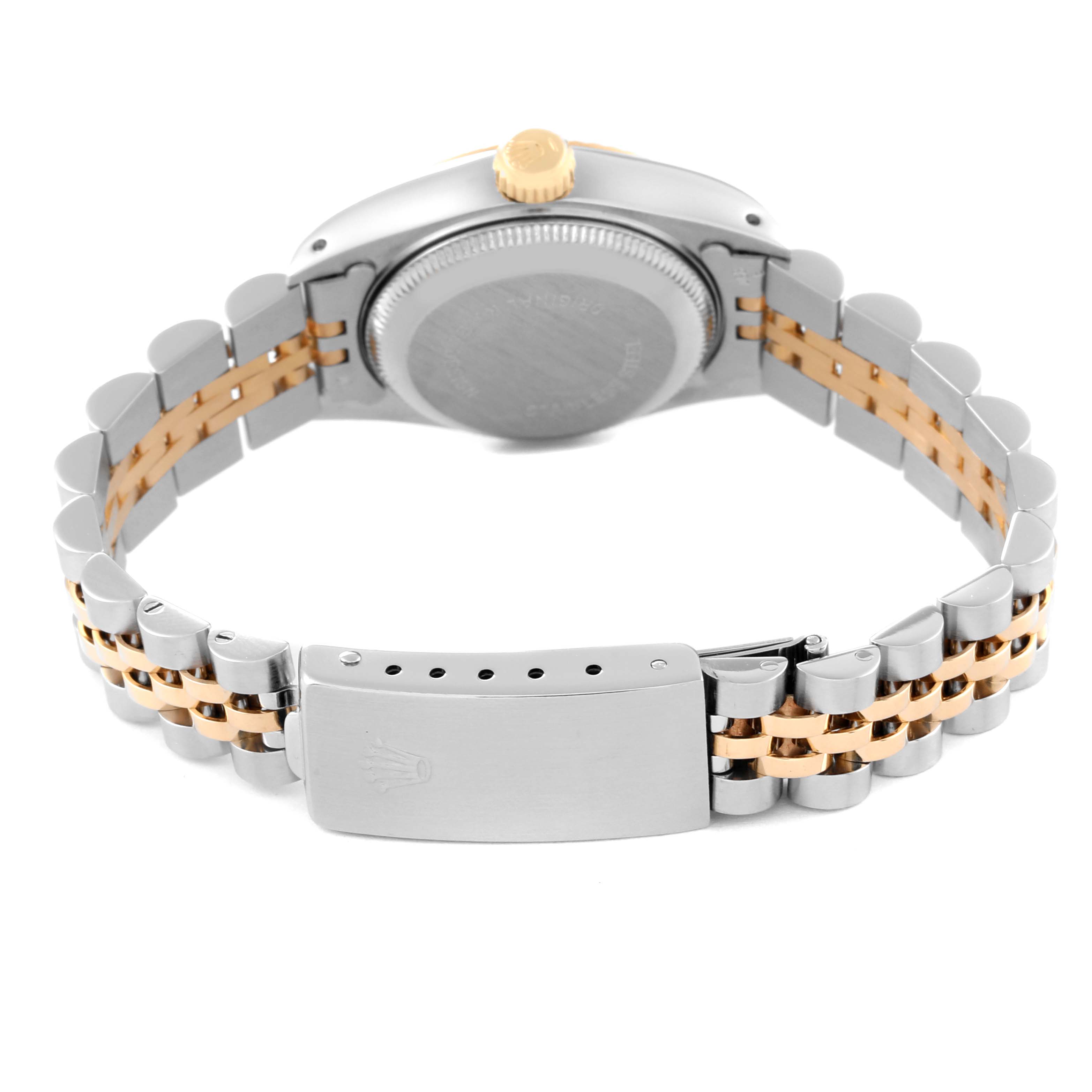 The image shows the back view of a Rolex Datejust 69173 Women's Steel and Gold (two tone) Champagne Dial 69173 Women's Steel and Gold (two tone) Champagne Dial watch, including its case back, bracelet, and clasp.