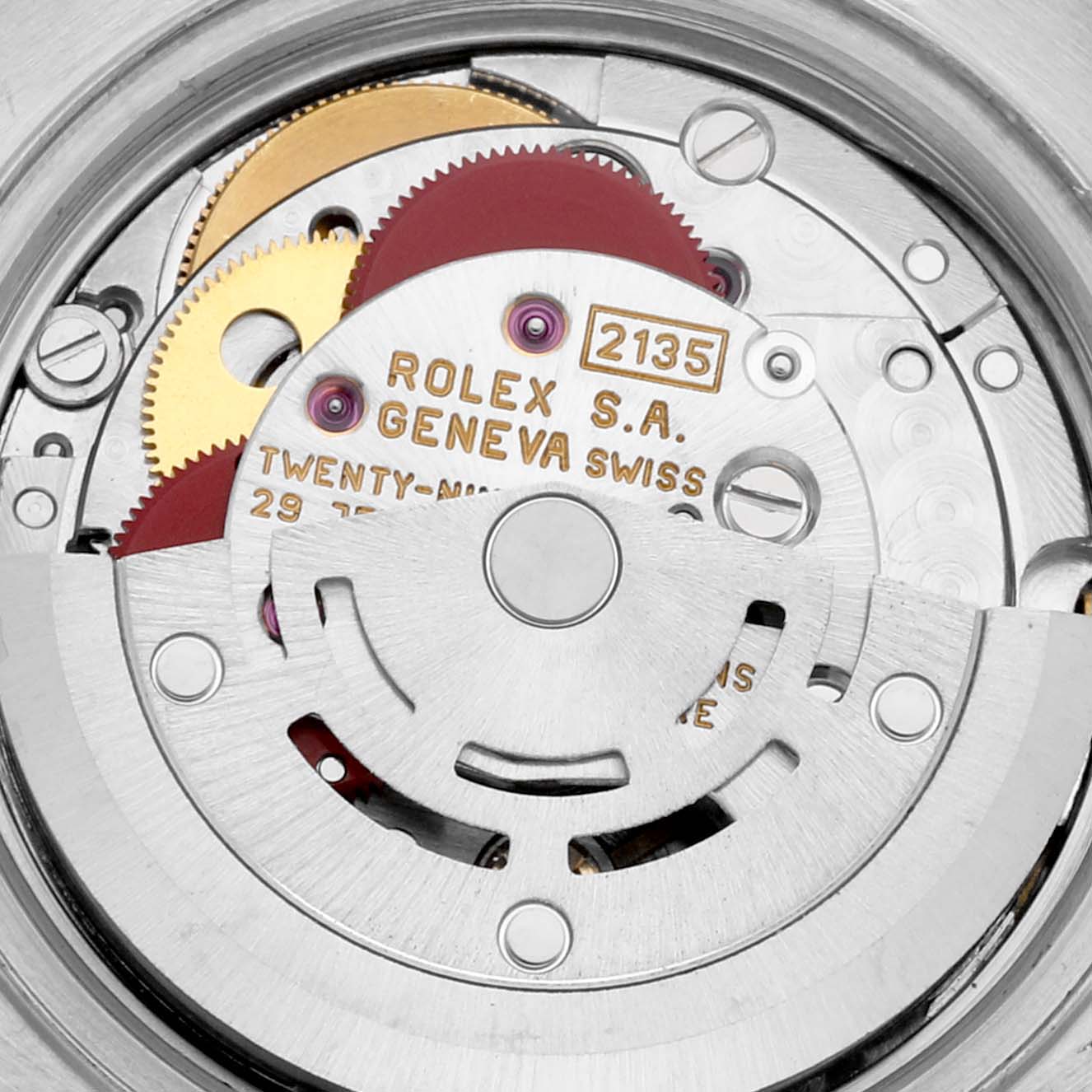 The image shows a close-up of the movement inside a Rolex Datejust 69173 Women's Steel and Gold (two tone) Champagne Dial 69173 Women's Steel and Gold (two tone) Champagne Dial watch, highlighting gears and mechanical parts.