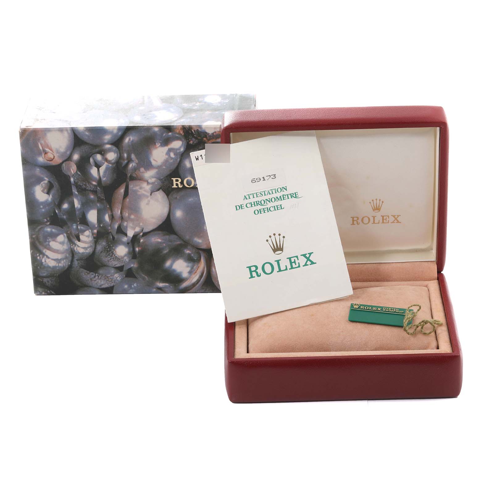 The image shows the packaging, manual, and tags for a Rolex Datejust 69173 Women's Steel and Gold (two tone) Champagne Dial 69173 Women's Steel and Gold (two tone) Champagne Dial model, including the box and documentation.