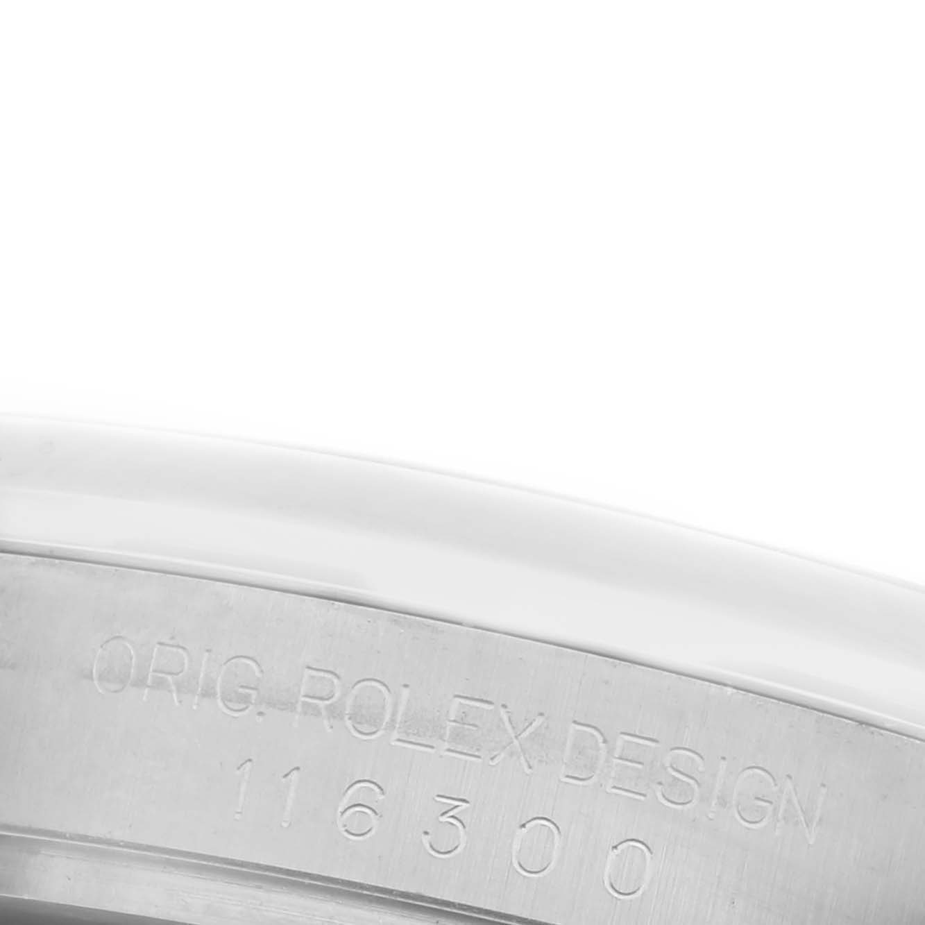 The image shows a close-up of the side of the Rolex Datejust 41 116300 Men
s Stainless Steel Silver Dial 116300 Men
s Stainless Steel Silver Dial, focusing on the engraved bezel detail.