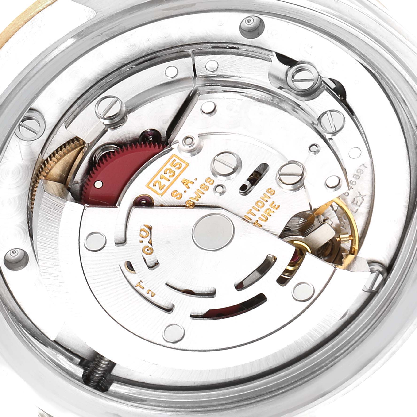 This image shows a close-up view of the internal mechanism of a Rolex Datejust 68273 Women's Steel and Gold (two tone) White Dial 68273 Women's Steel and Gold (two tone) White Dial watch movement.