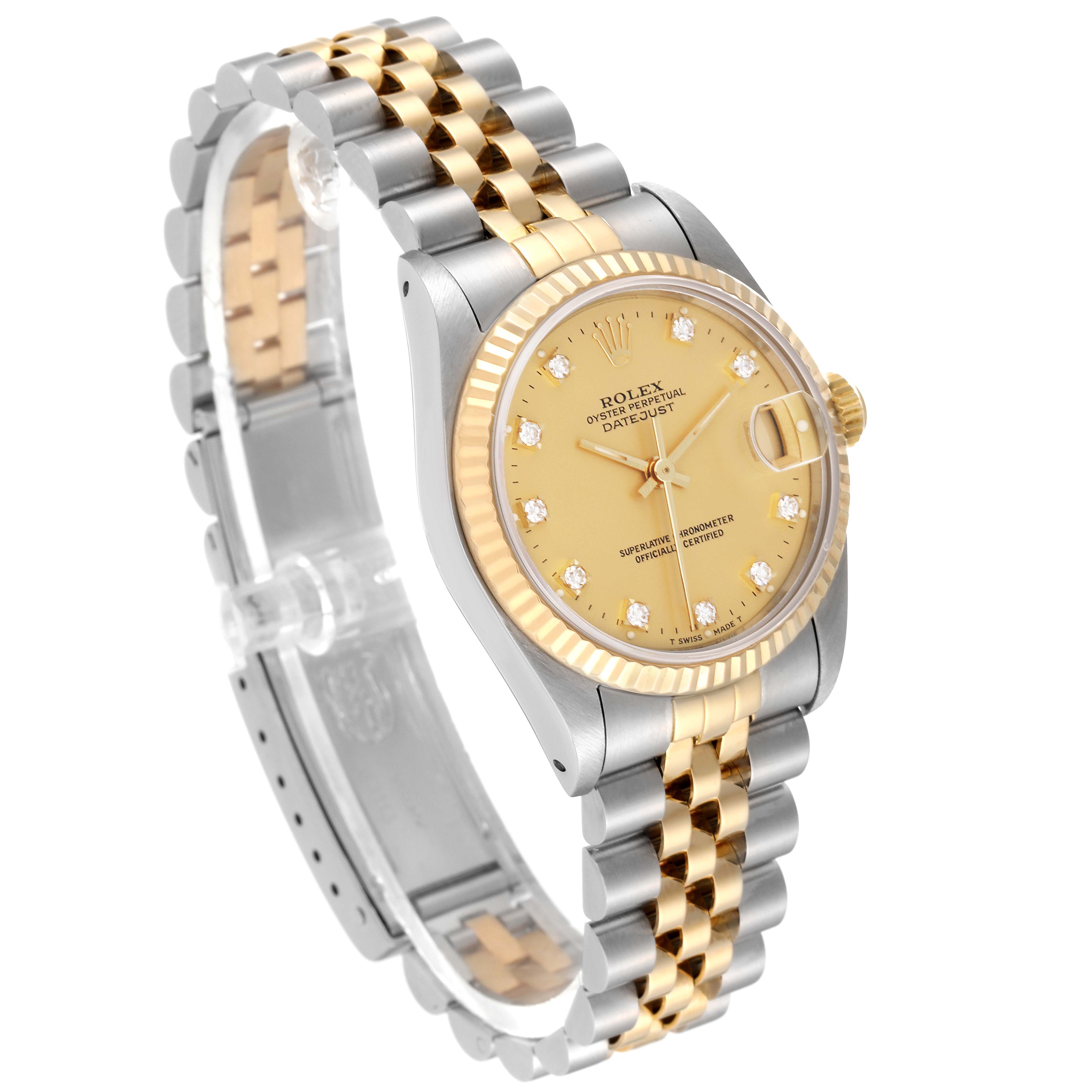 This is a Rolex Mid-Size 68273G Women's Steel and Gold (two tone) Champagne Dial 68273G Women's Steel and Gold (two tone) Champagne Dial Datejust watch, photographed at a three-quarter angle showcasing the face, bezel, and bracelet.