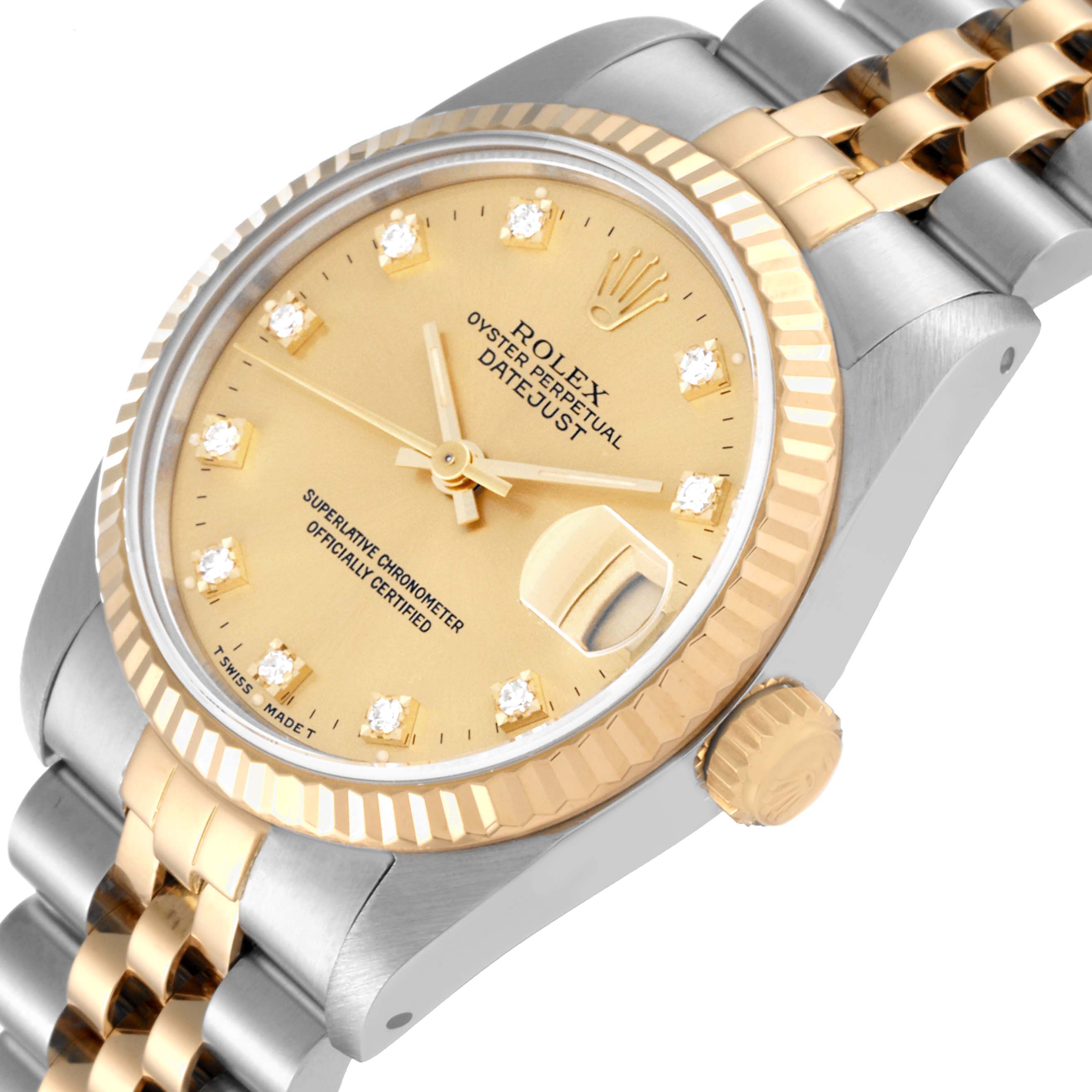 The Rolex Mid-Size 68273G Women's Steel and Gold (two tone) Champagne Dial 68273G Women's Steel and Gold (two tone) Champagne Dial Datejust watch is shown at a slight angle, highlighting its face, bezel, crown, and part of the bracelet.