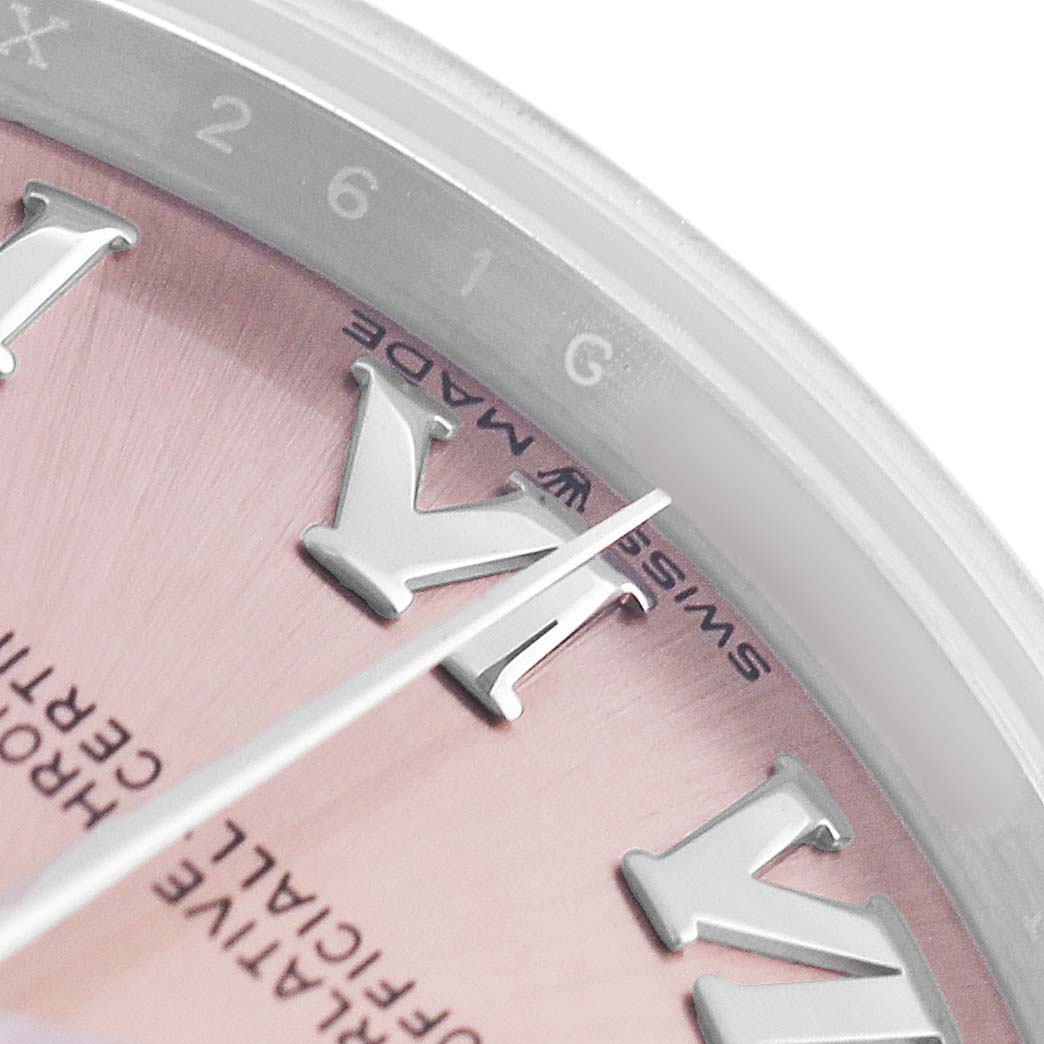 The image shows a close-up of the Rolex Datejust 278240 Women's Stainless Steel Pink Dial watch dial, highlighting the Roman numerals and part of the minute track.