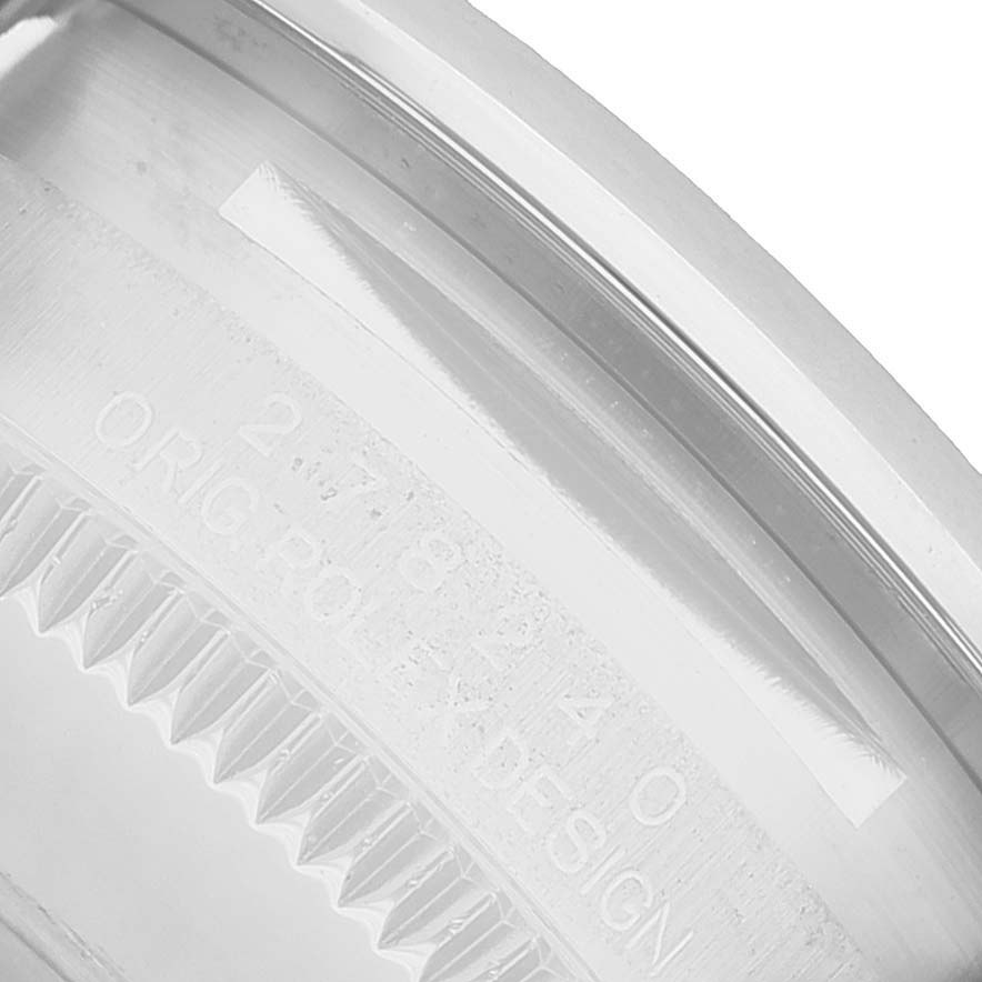 The image shows a close-up of the inner bezel with engravings on a Rolex Datejust 278240 Women's Stainless Steel Pink Dial watch.