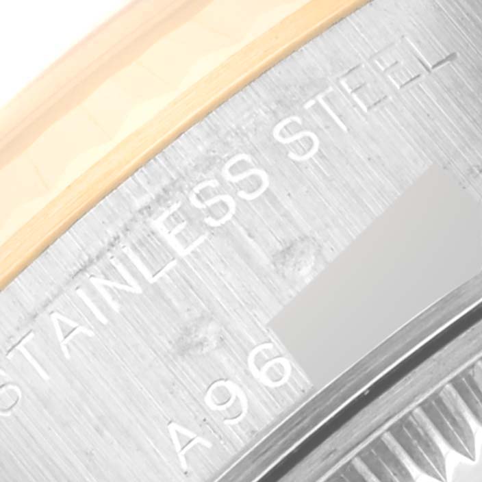 This image shows a close-up of the stainless steel case back of a Rolex Datejust 79173G Women's Steel and Gold (two tone) Champagne Dial 79173G Women's Steel and Gold (two tone) Champagne Dial watch.