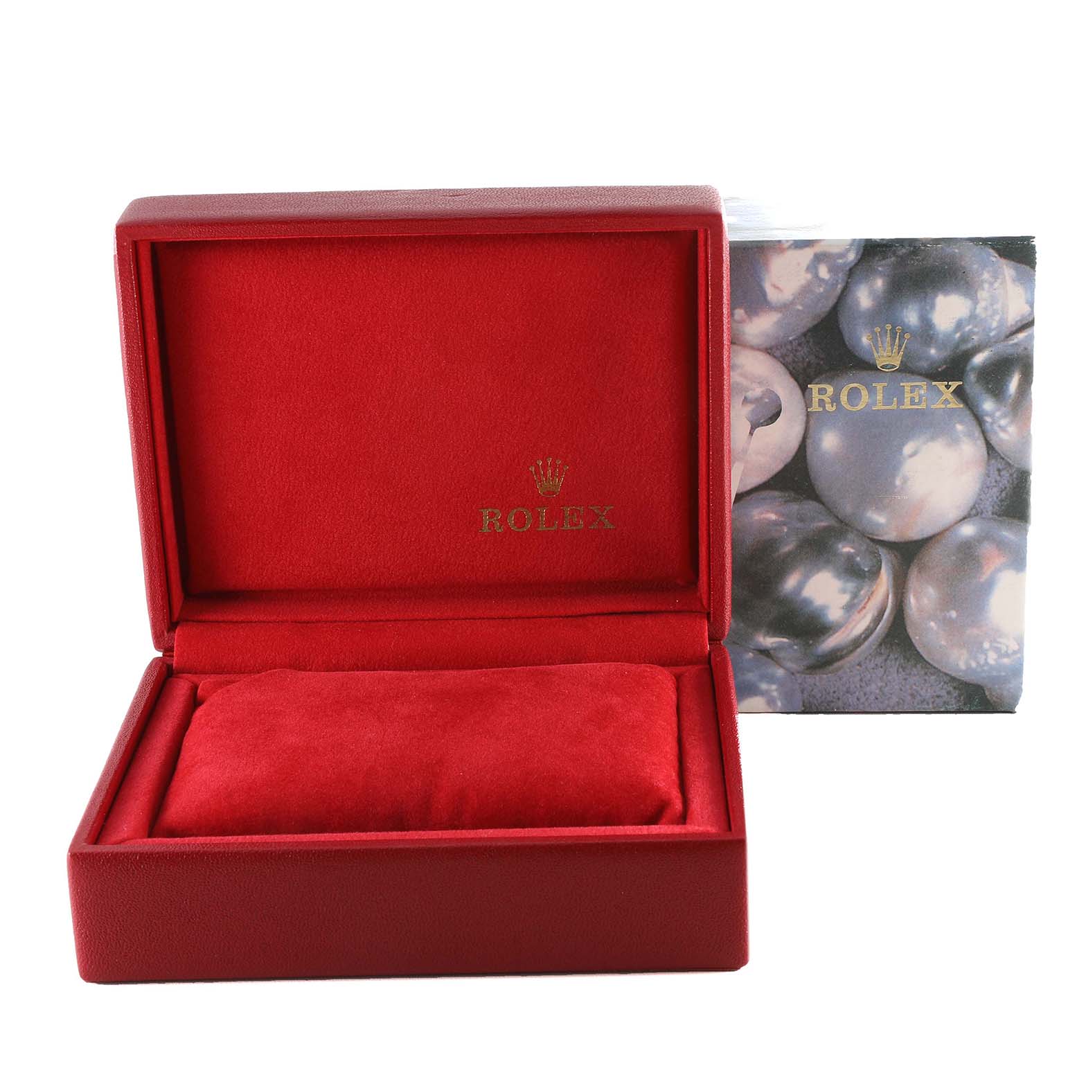 This image shows an open red Rolex Datejust 79173G Women's Steel and Gold (two tone) Champagne Dial 79173G Women's Steel and Gold (two tone) Champagne Dial watch box with a cushion inside and a decorative box in the background.